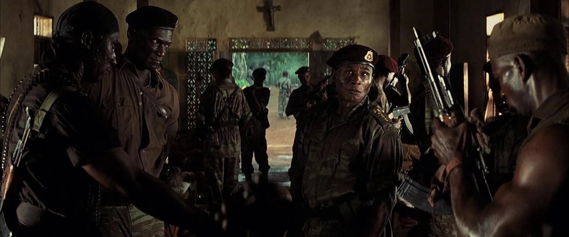 Malick Bowens and Peter Mensah in Tears of the Sun (2003)