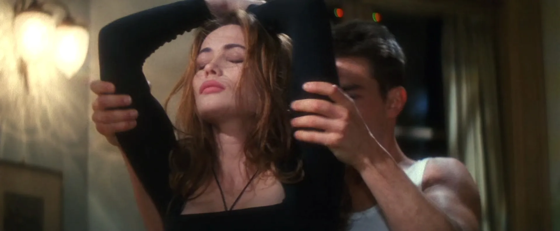 Tom Cruise and Emmanuelle Béart in Mission: Impossible (1996)