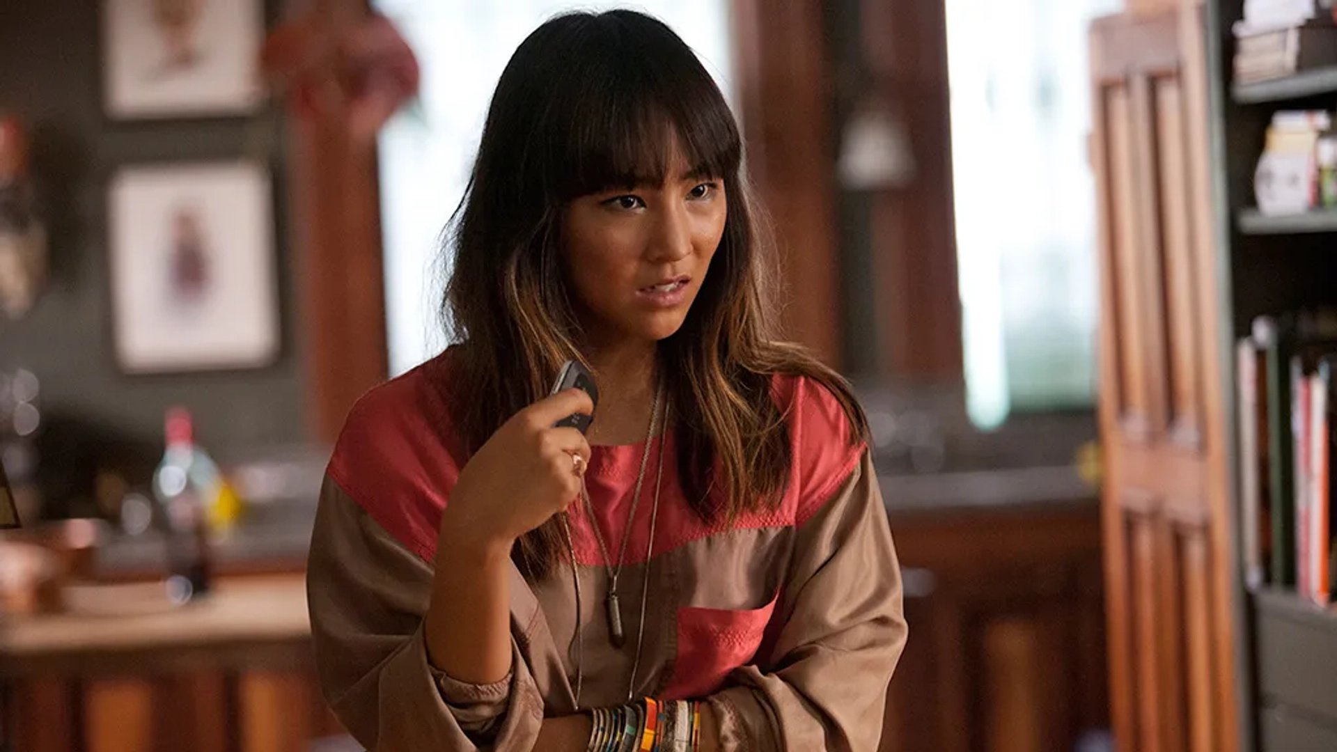 Still of Greta Lee as "Soojin"