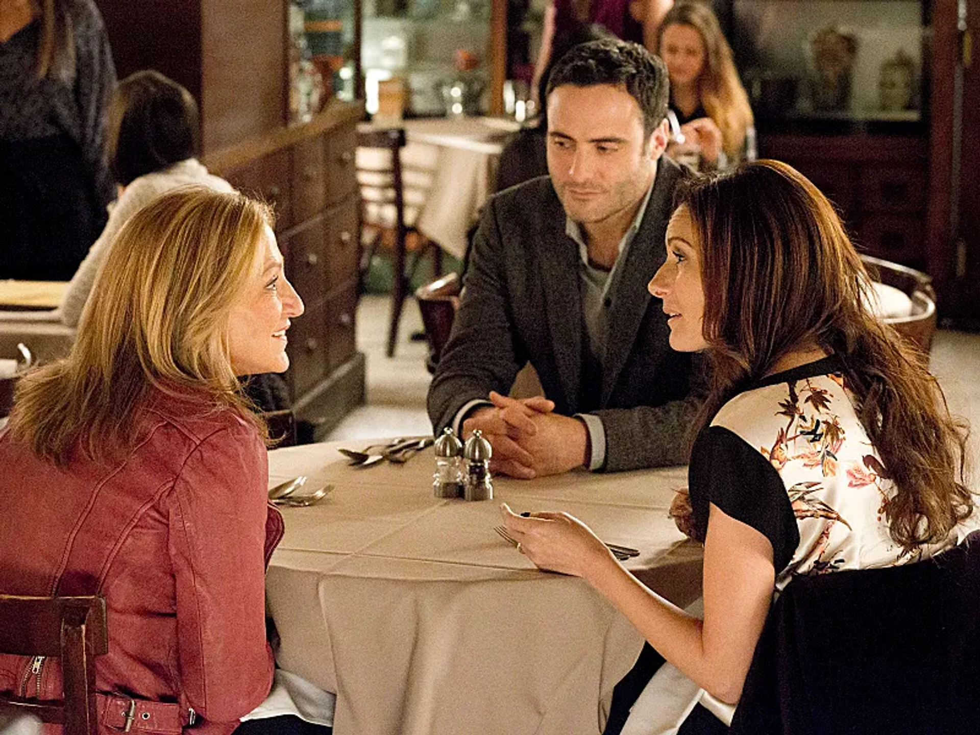 Edie Falco, Dominic Fumusa, and Laura Benanti in Nurse Jackie (2009)