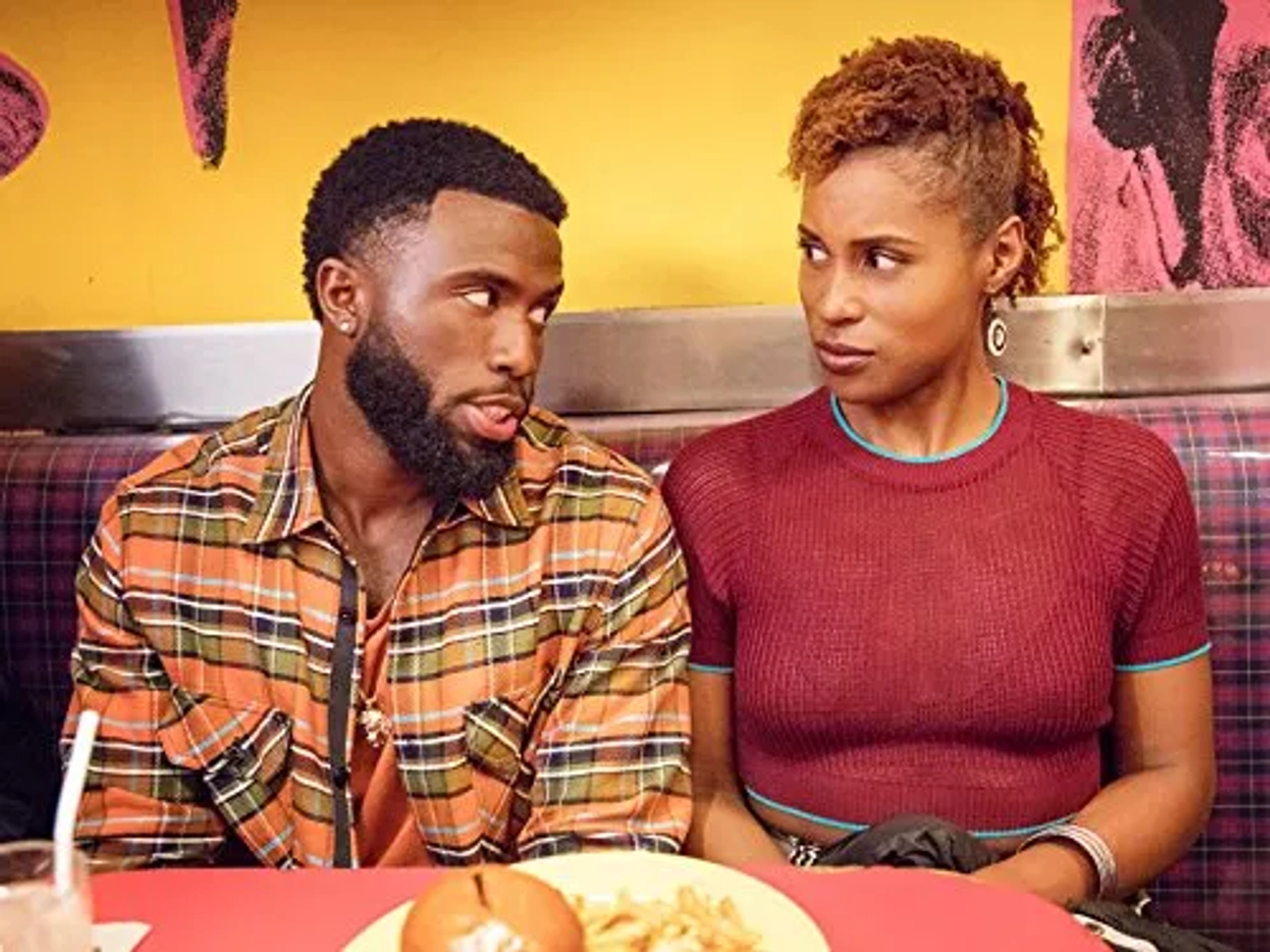 Issa Rae and Y'lan Noel in Insecure (2016)