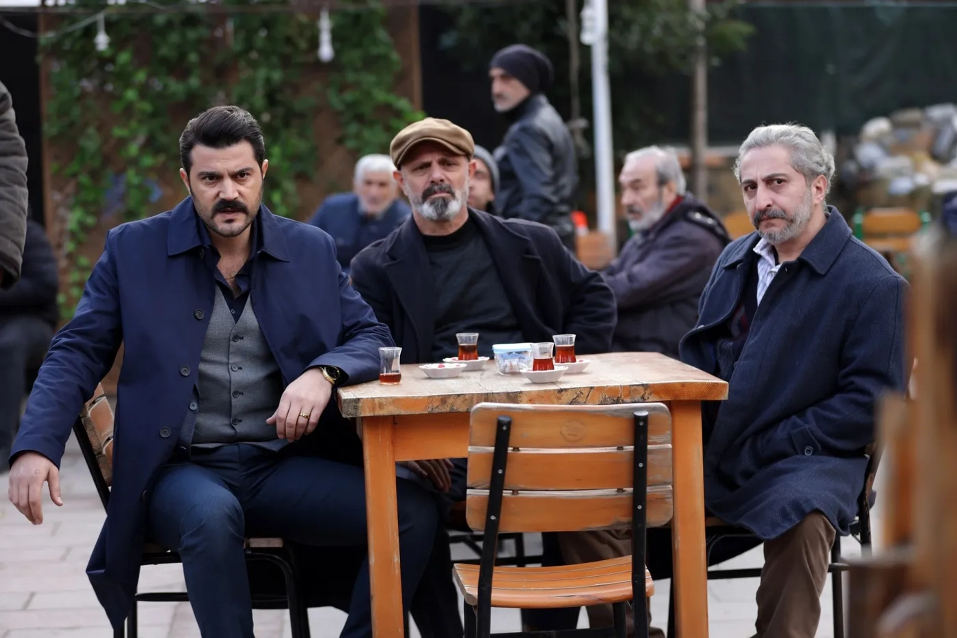 Ihsan Ilhan, Haydar Sisman, and Burak Sevinç in Boundless Love (2023)