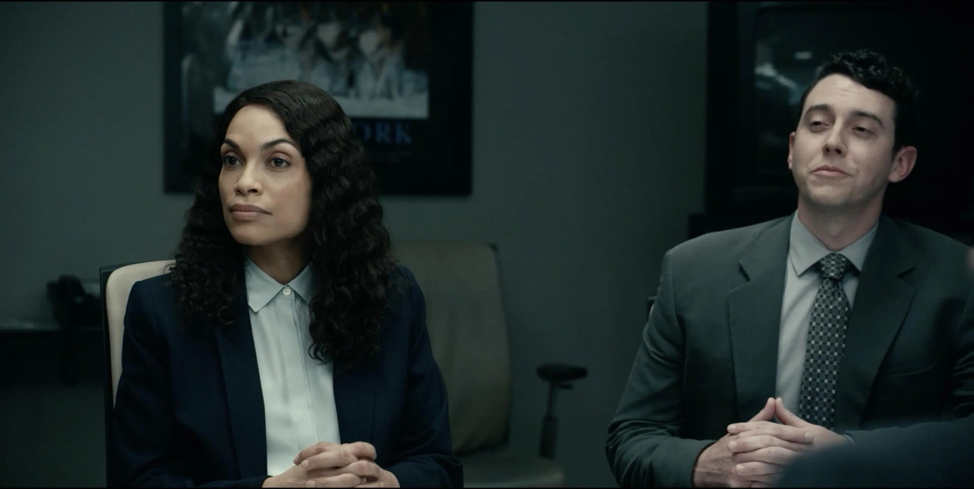 Austin Freeman and Rosario Dawson Listen to the Sackler Legal team in Dopesick on Hulu