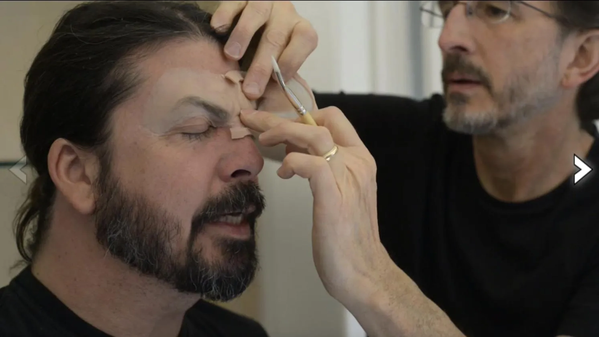 "STUDIO 666" Behind the Scenes: Makeup Effects Designer Tony Gardner starts the prosthetic application process that will turn The Foo Fighters' Dave Grohl into the possessed "Demonic Dave" character for the final scenes of this Foo Fighter's horror comedy movie.