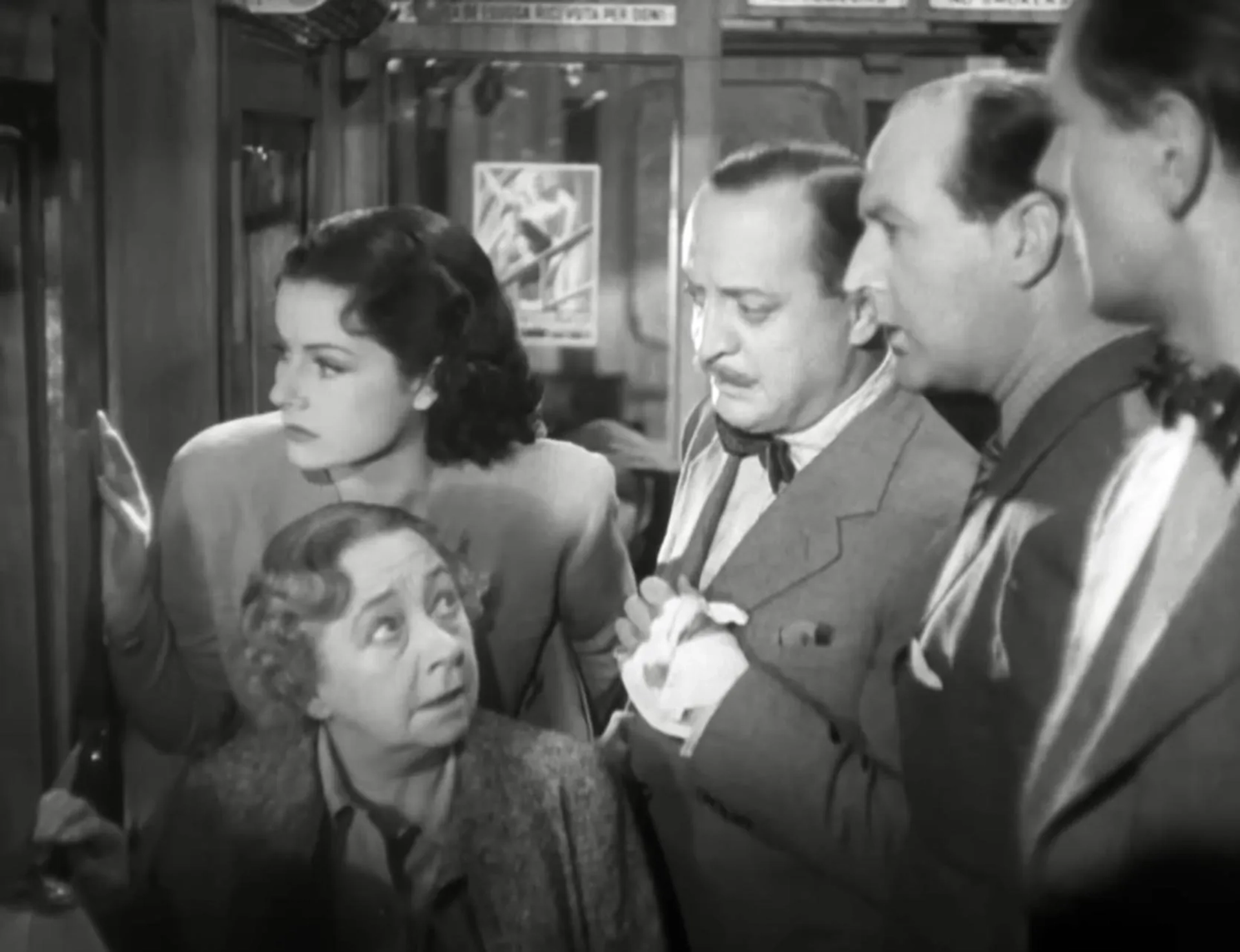 Margaret Lockwood, Cecil Parker, Basil Radford, Michael Redgrave, and May Whitty in The Lady Vanishes (1938)