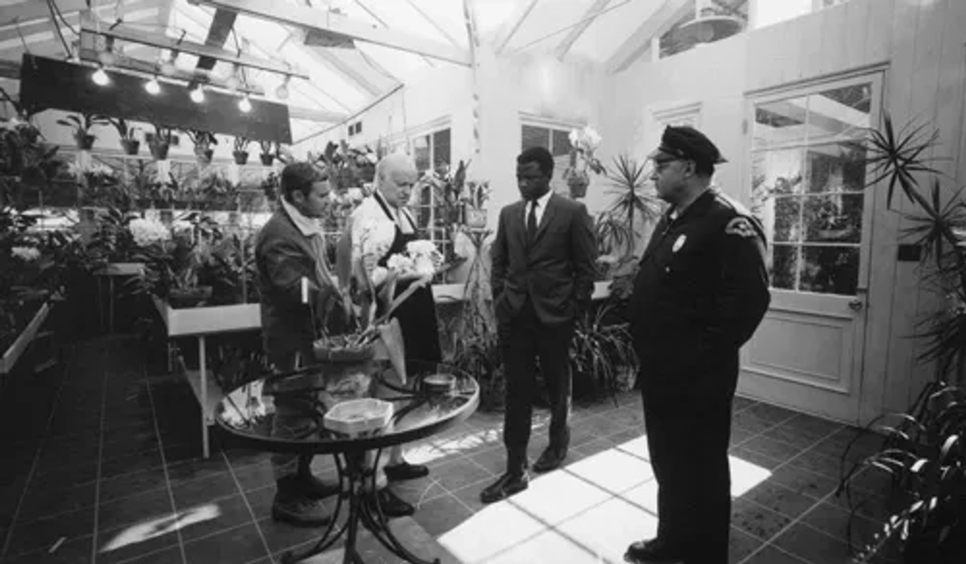 Sidney Poitier, Rod Steiger, Larry Gates, and Norman Jewison in In the Heat of the Night (1967)