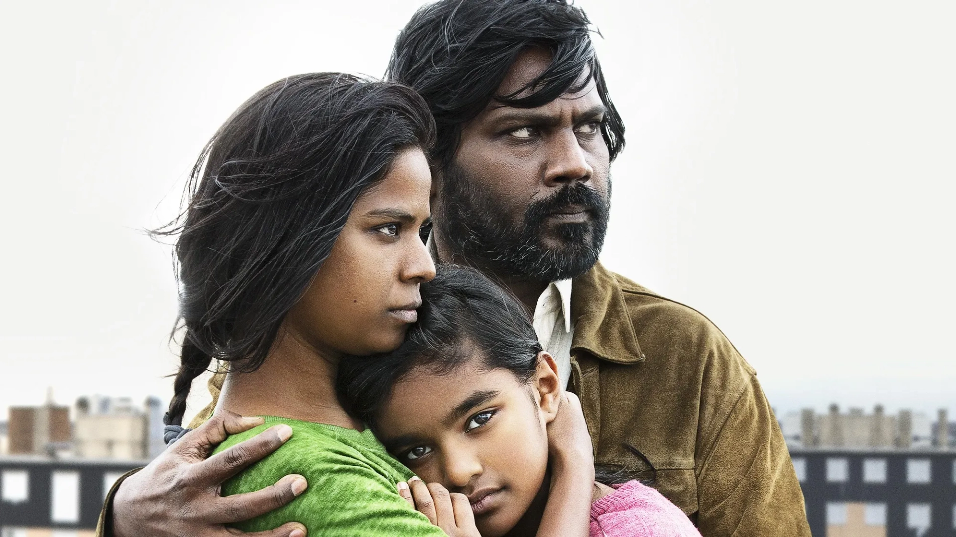 Jesuthasan Antonythasan, Kalieaswari Srinivasan, and Claudine Vinasithamby in Dheepan (2015)