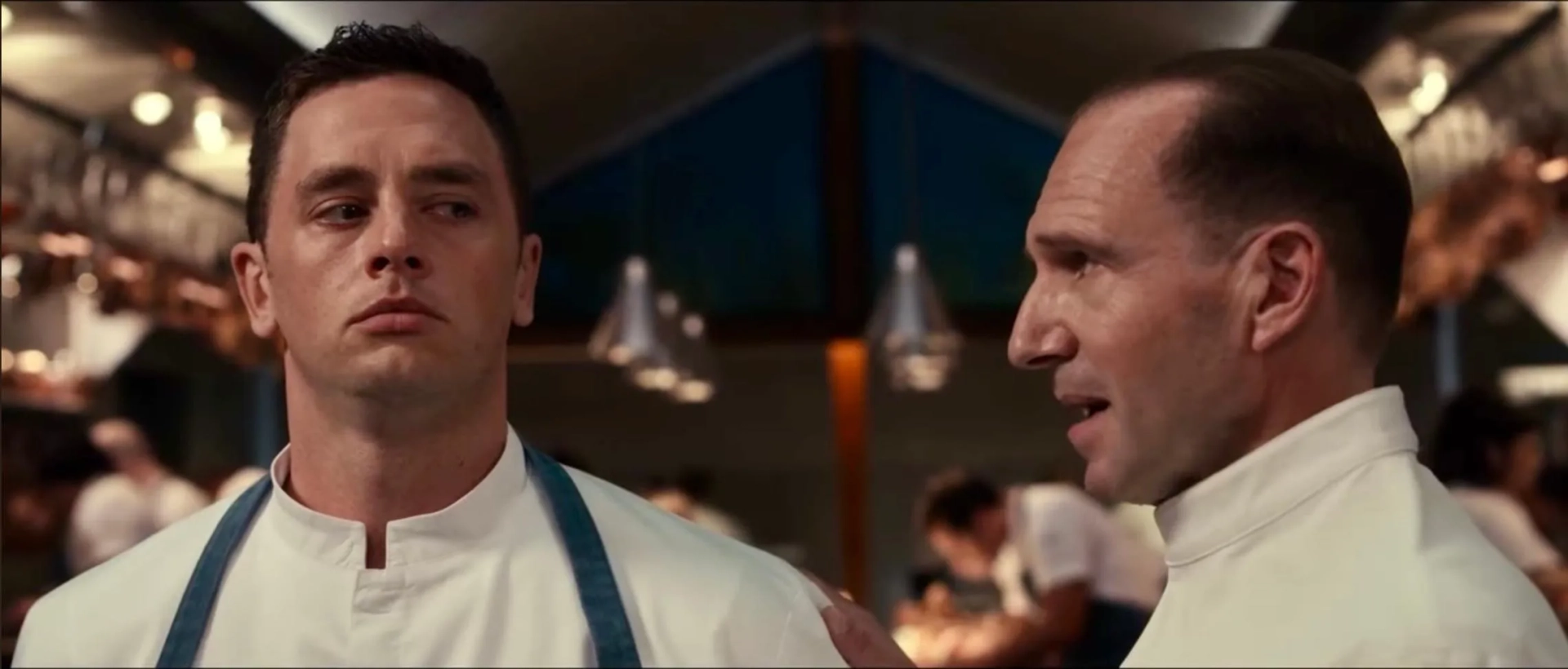 Ralph Fiennes and Adam Aalderks in The Menu (2022)