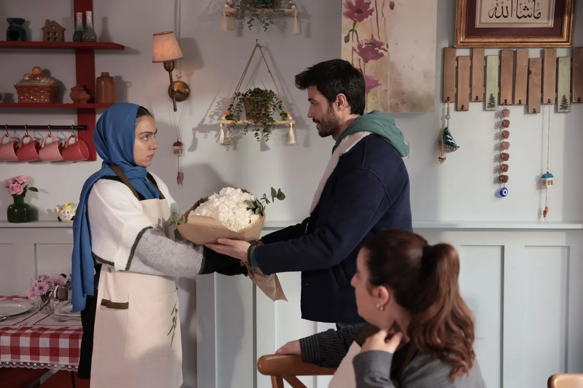 Merve Dizdar, Emre Taskiran, and Gulcin Kultur Sahin in Ömer (2023)