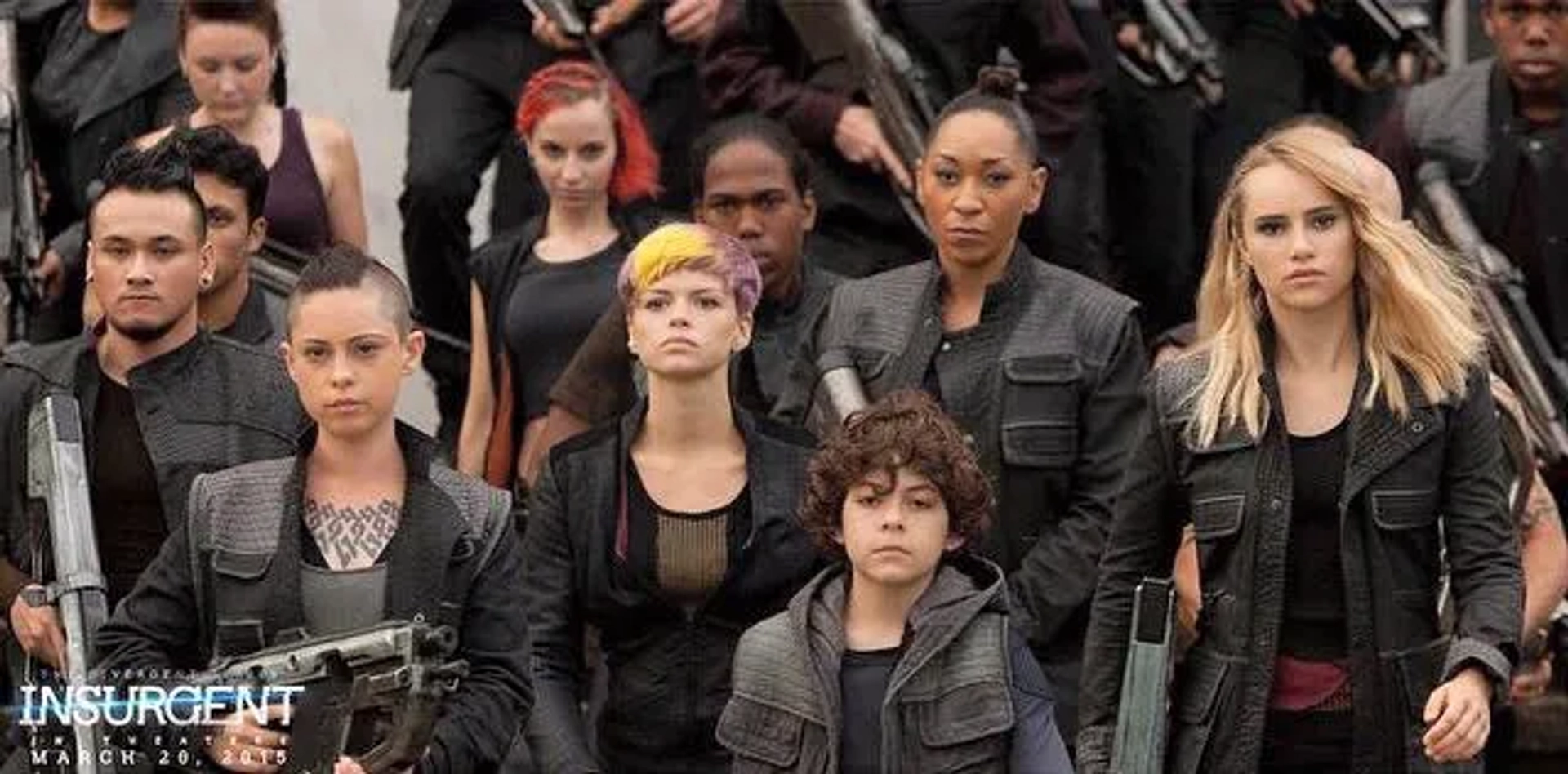 Still of Emma Elle Roberts, Rosa Salazar, Emjay Anthony, and Suki Waterhouse with the Dauntless Rebels for the film Insurgent.