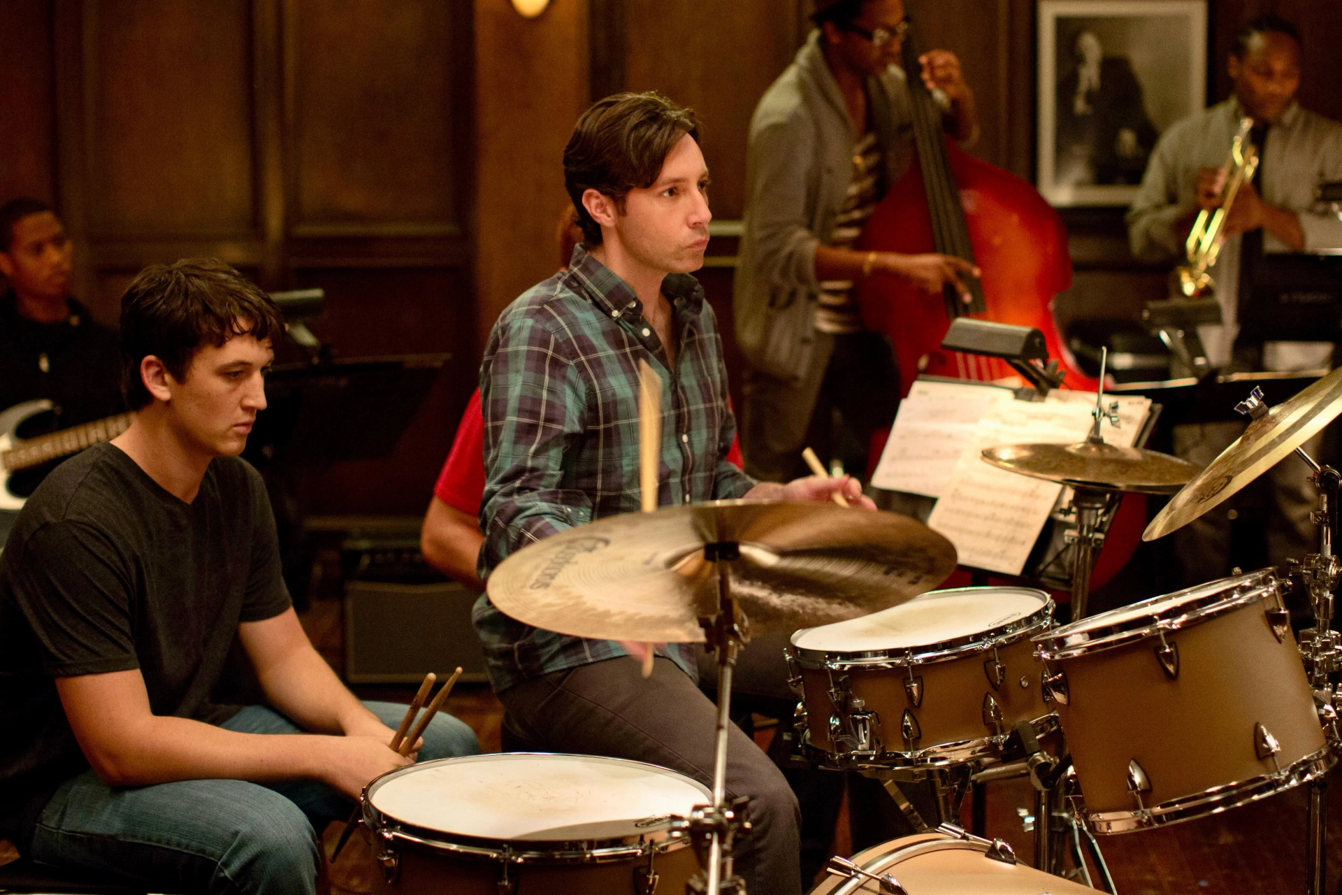 Miles Teller and Nate Lang in Whiplash (2014)