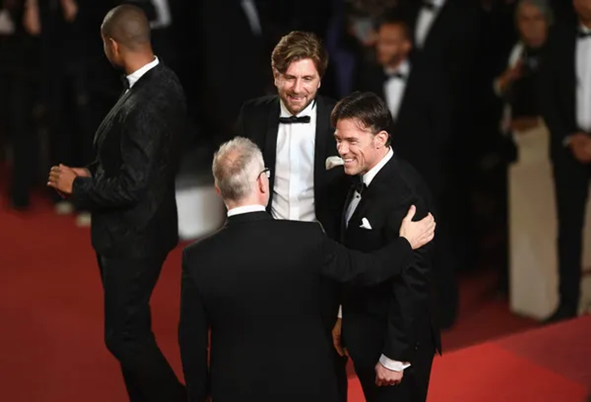 Terry Notary with Reuben Ostlund and Thierry Fremaux on the red carpet at Cannes Film Festival