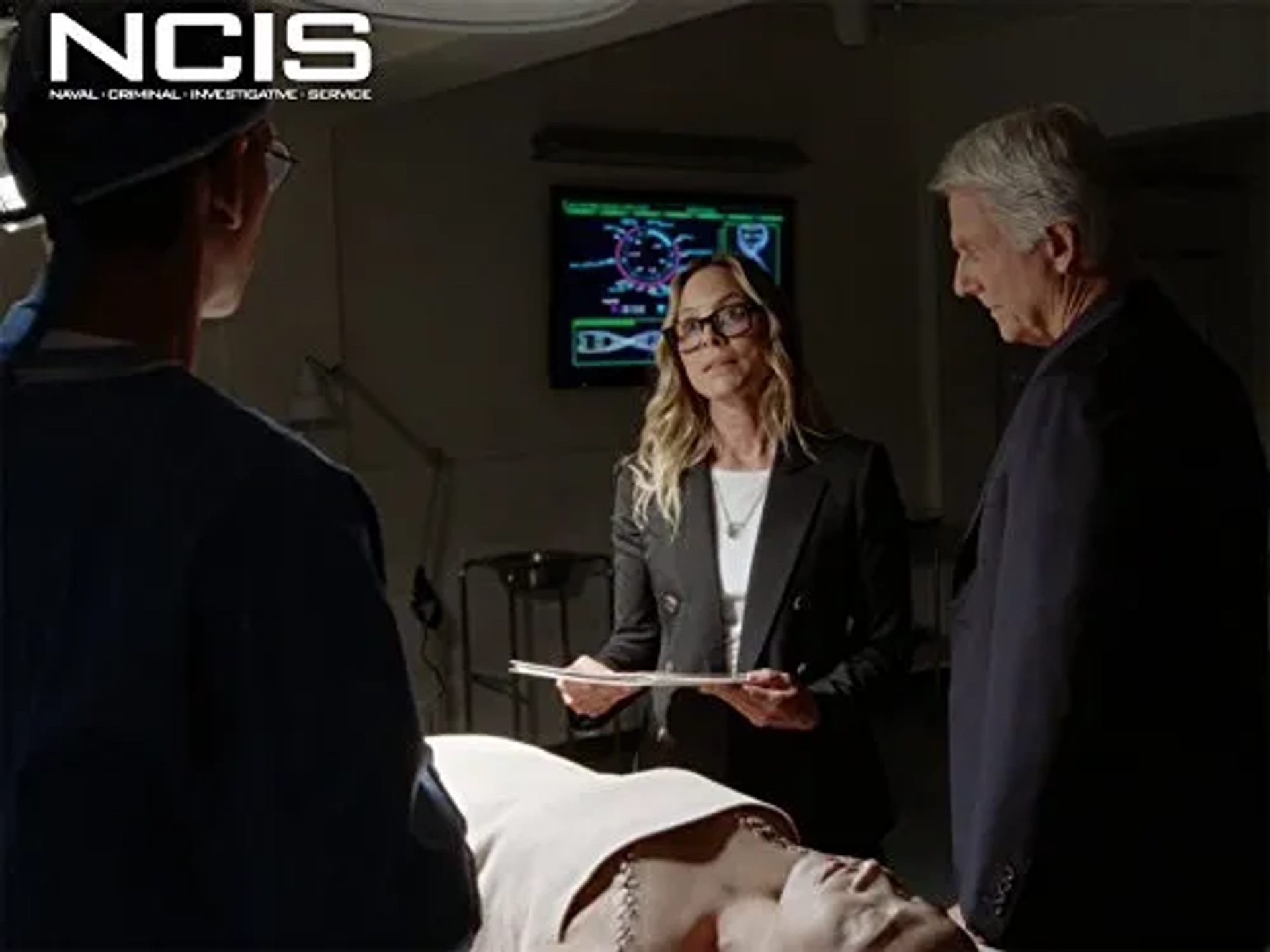 Mark Harmon, Maria Bello, and Brian Dietzen in NCIS (2003)