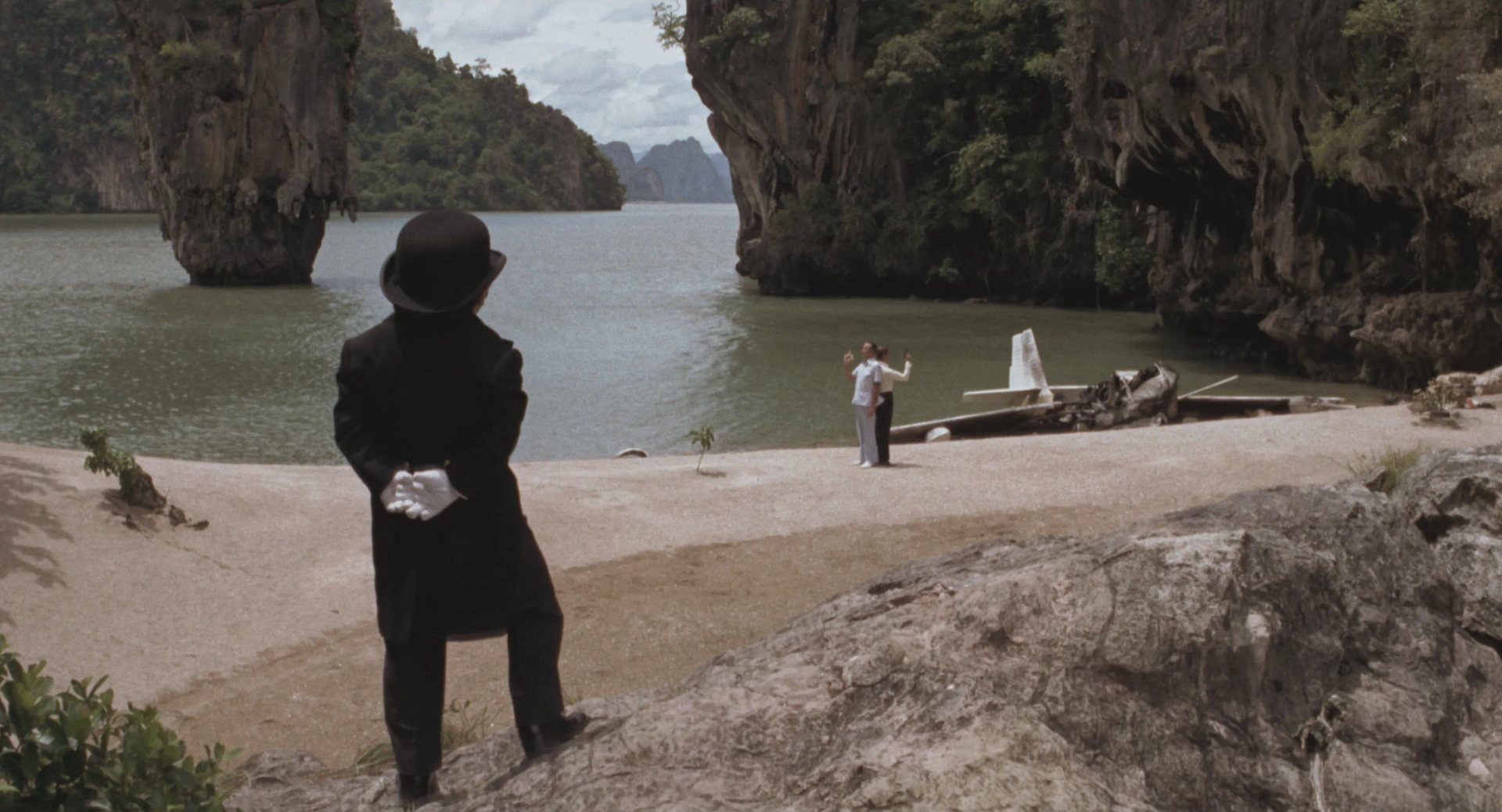 Christopher Lee, Roger Moore, and Hervé Villechaize in The Man with the Golden Gun (1974)