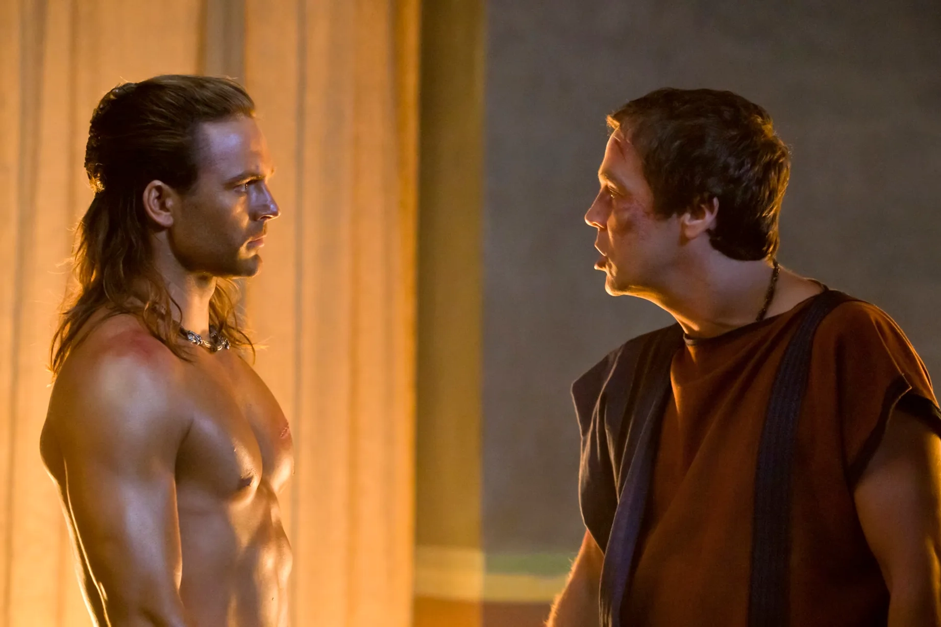 John Hannah and Dustin Clare in Spartacus: Gods of the Arena (2011)