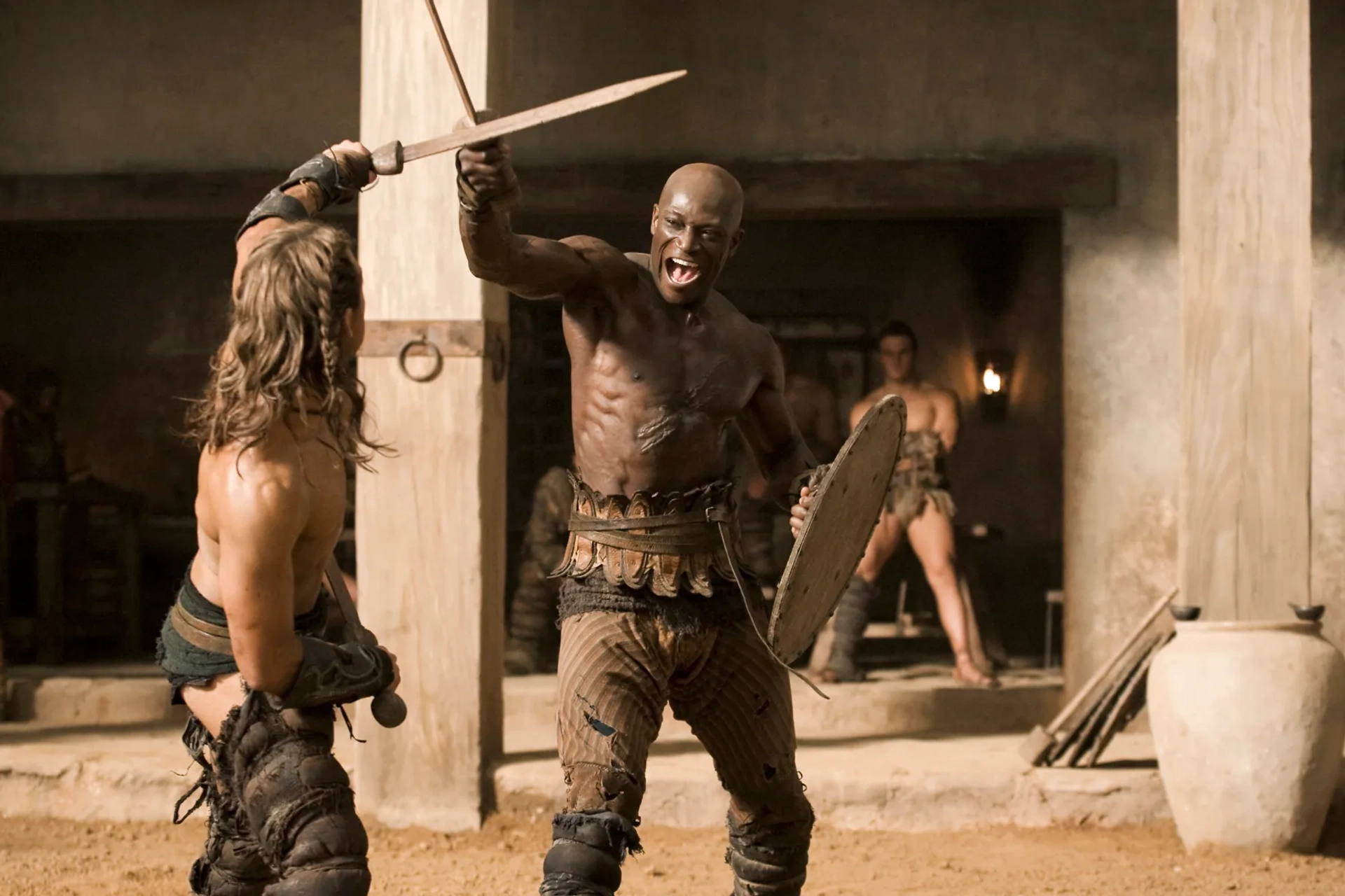 Peter Mensah and Dustin Clare in Spartacus: Gods of the Arena (2011)