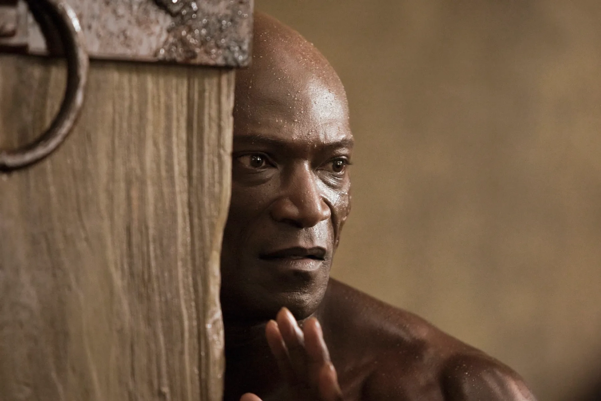 Peter Mensah in Spartacus: Gods of the Arena (2011)