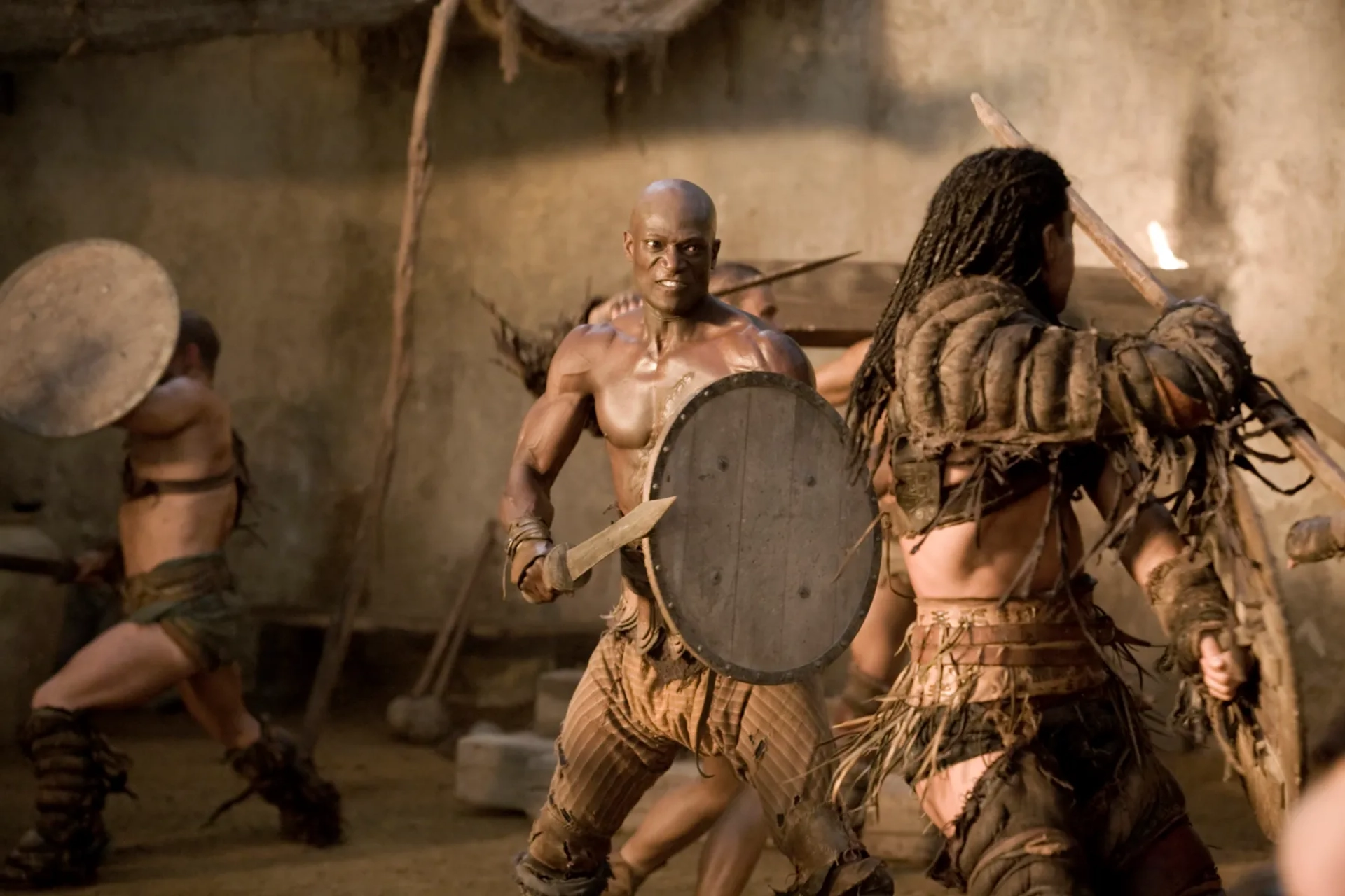 Peter Mensah and Antonio Te Maioha in Spartacus: Gods of the Arena (2011)