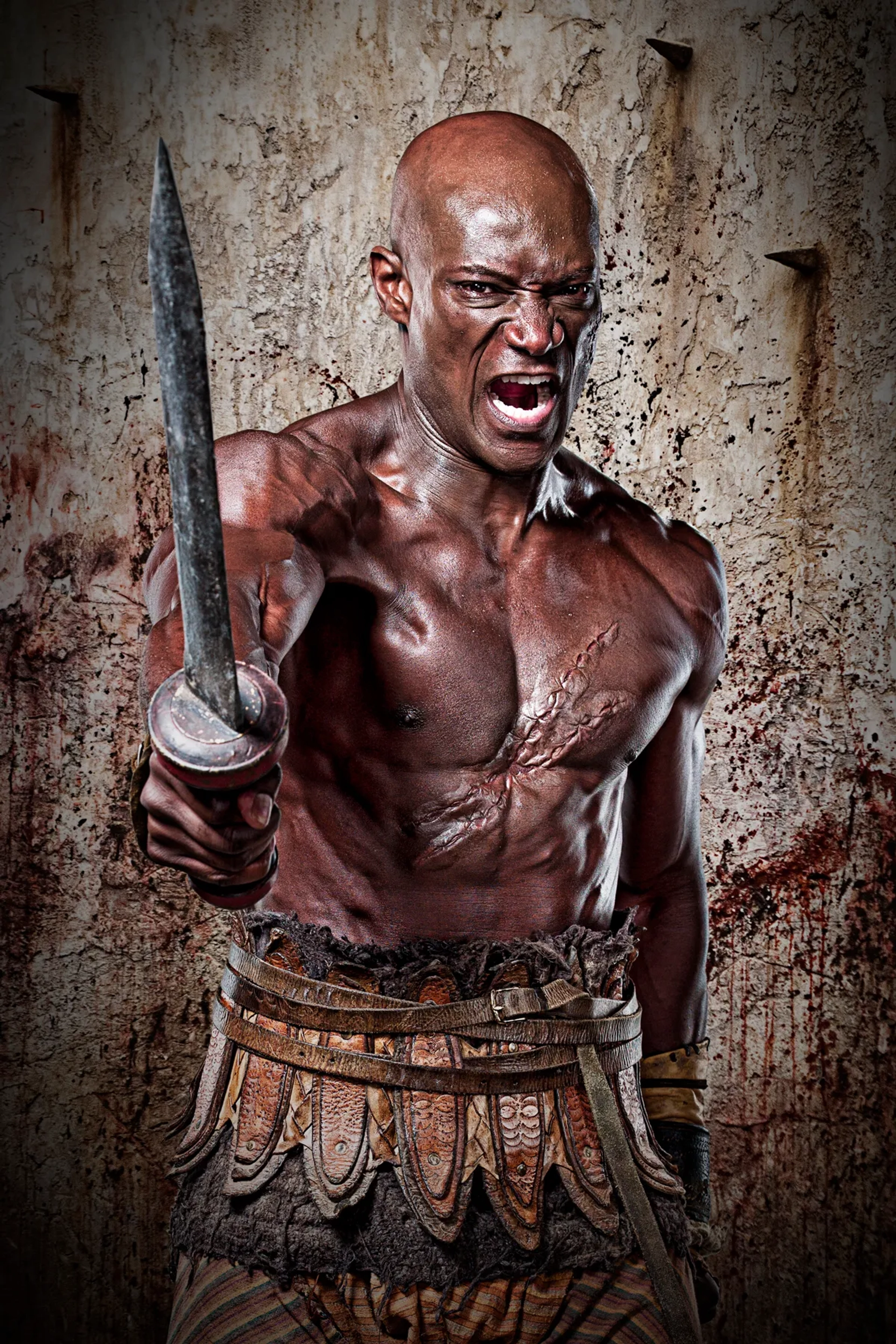 Peter Mensah in Spartacus: Gods of the Arena (2011)