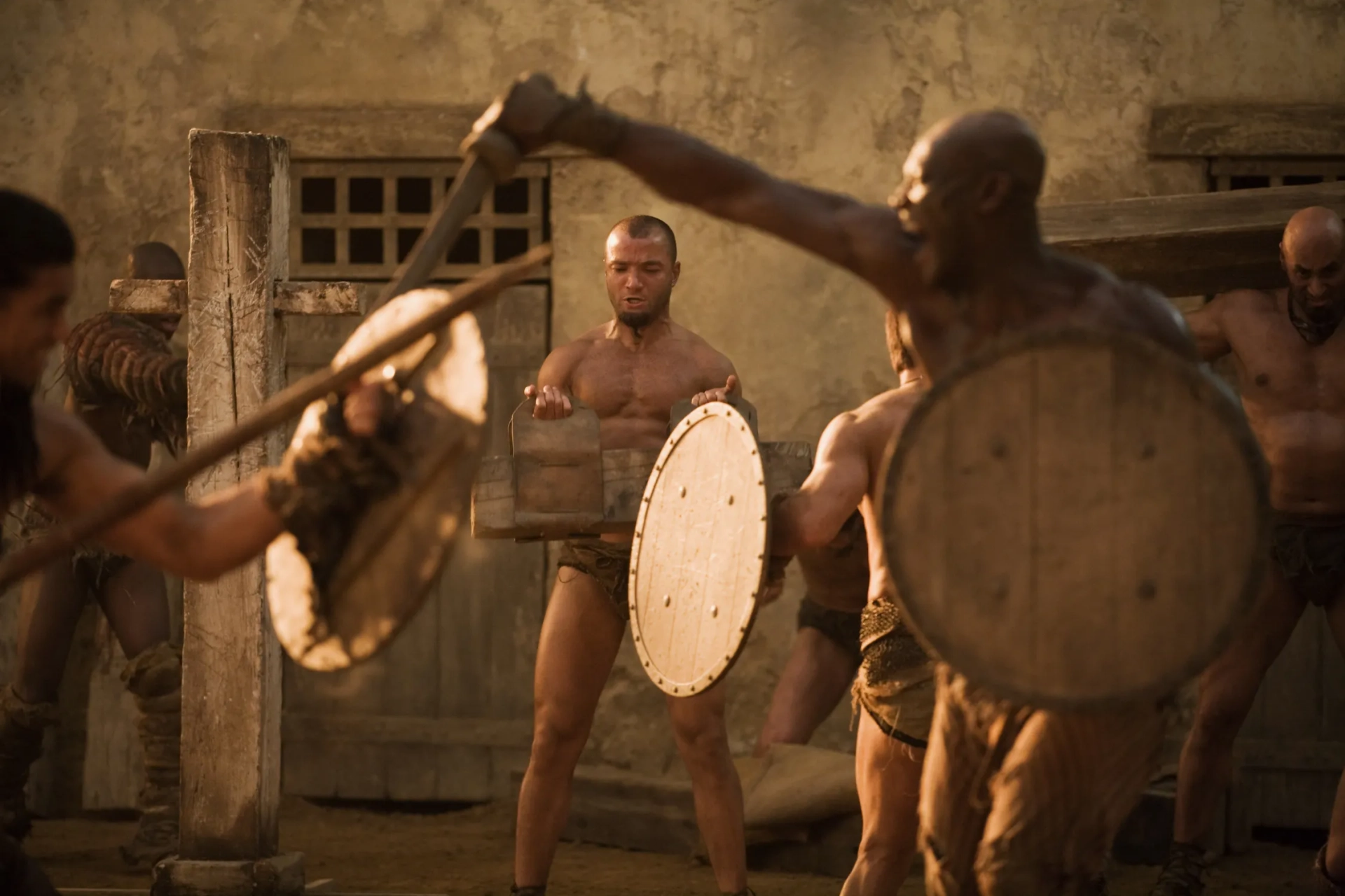 Peter Mensah, Shane Rangi, Nick E. Tarabay, and Antonio Te Maioha in Spartacus: Gods of the Arena (2011)