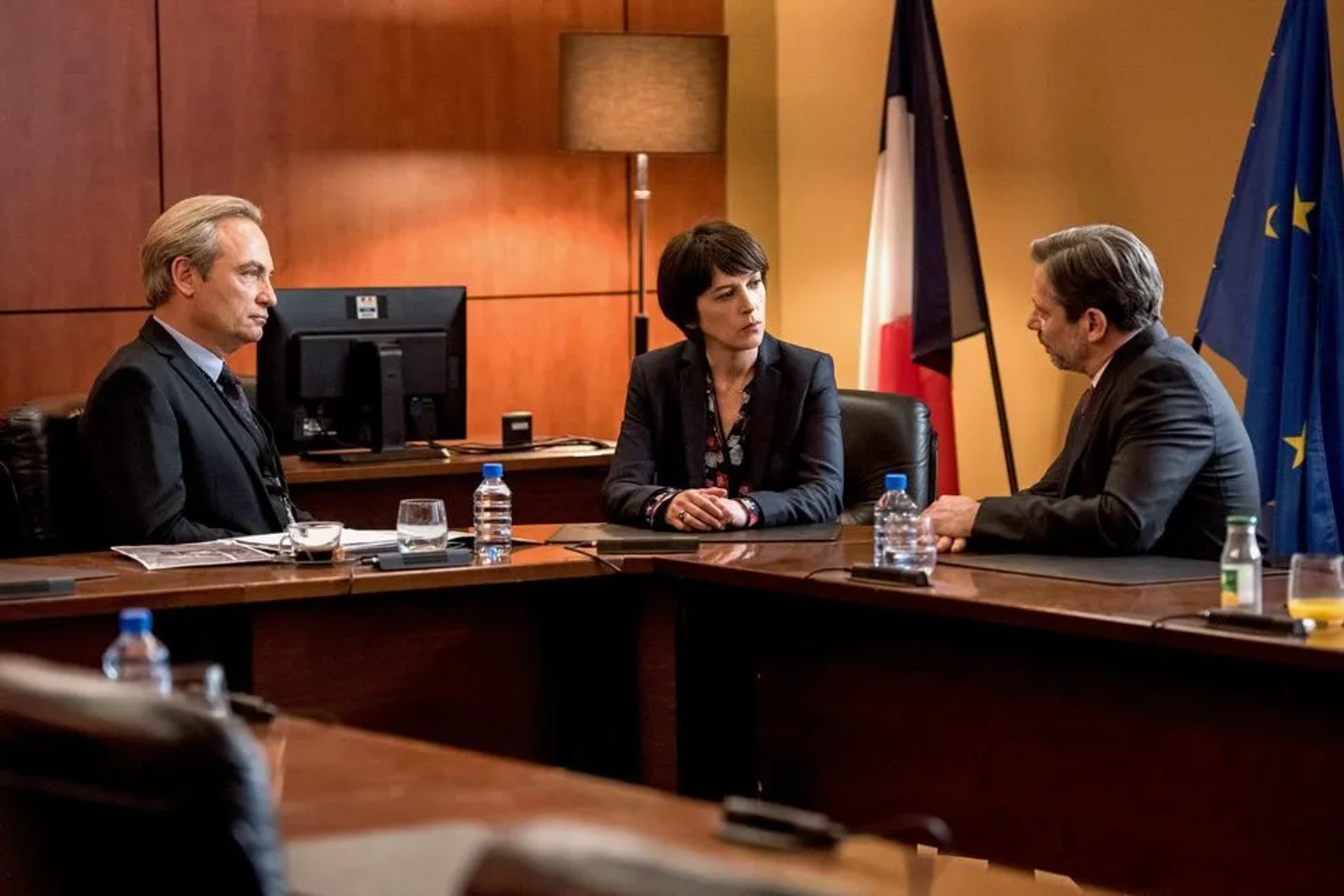 Mathieu Amalric, Gilles Cohen, and Florence Loiret Caille in The Bureau (2015)