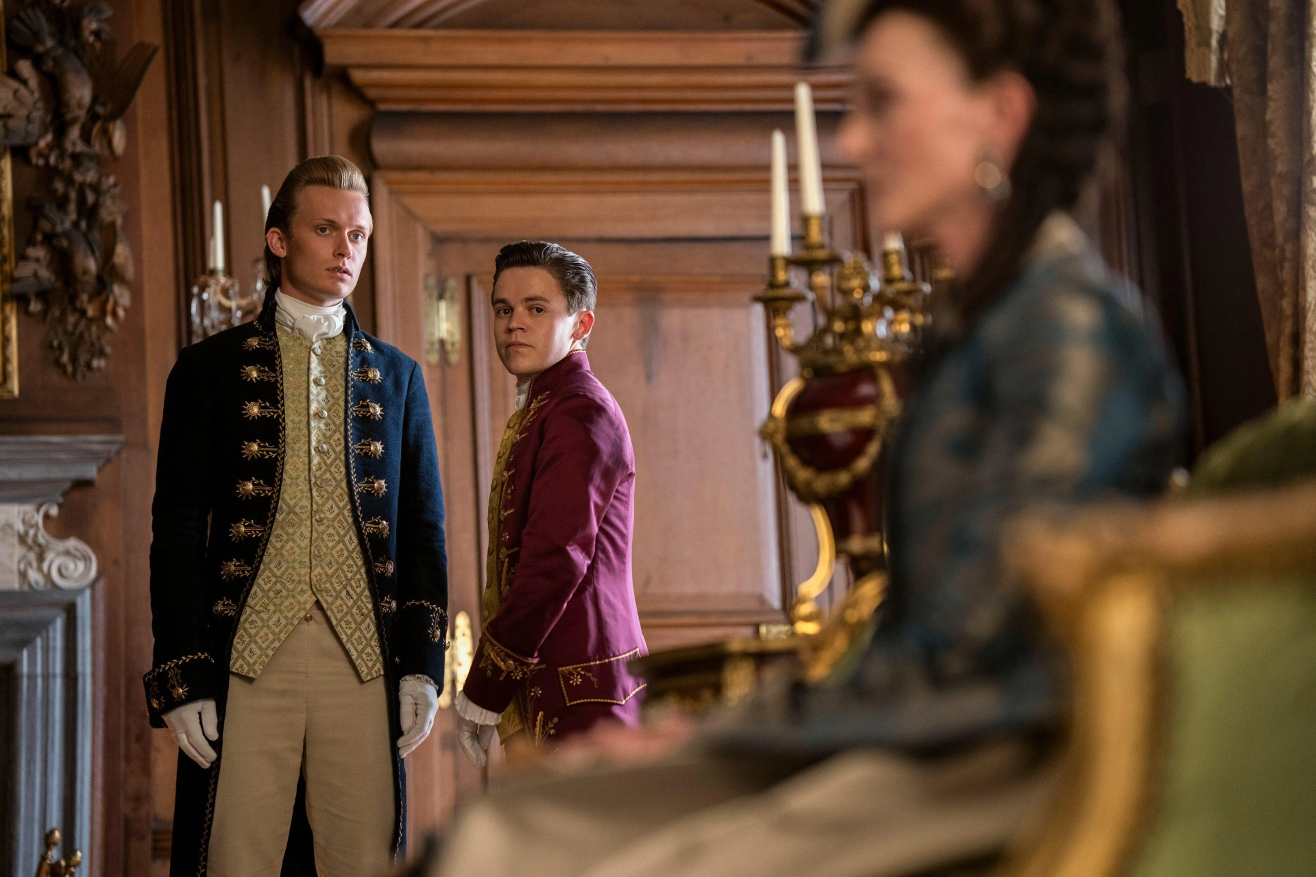 Michelle Fairley, Freddie Dennis, and Sam Clemmett in Queen Charlotte: A Bridgerton Story (2023)