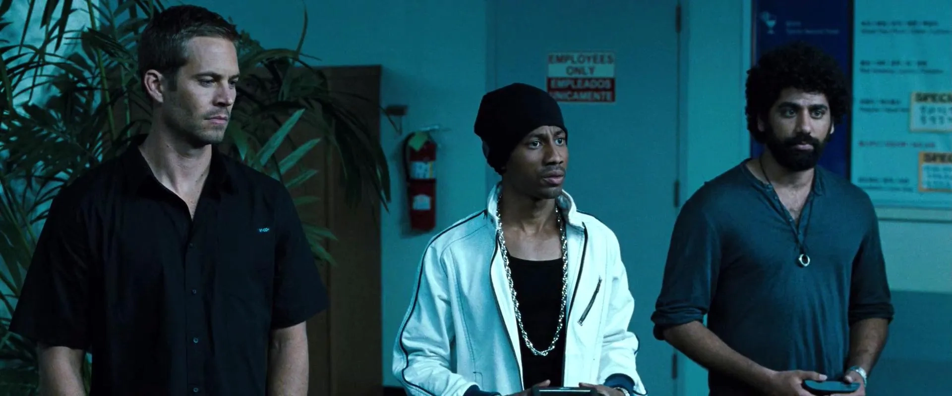 Paul Walker, Brandon T. Jackson, and Mousa Hussein Kraish in Fast & Furious (2009)