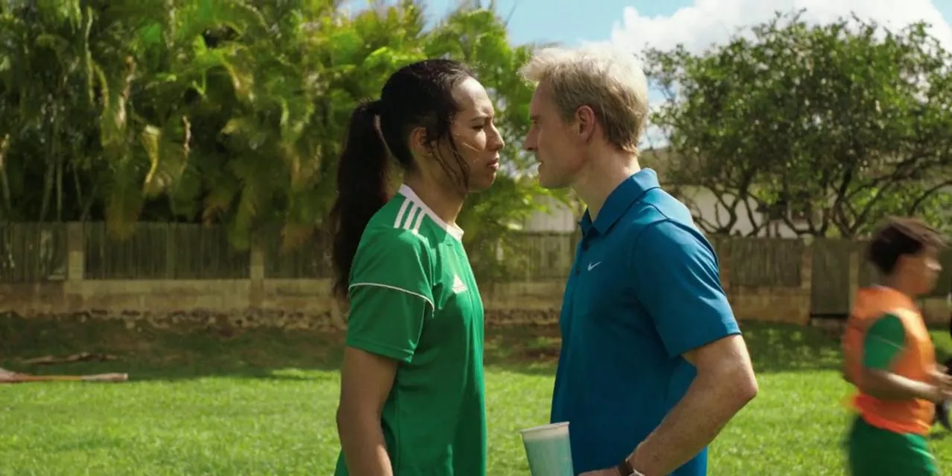 Michael Fassbender and Kaimana in Next Goal Wins (2023)