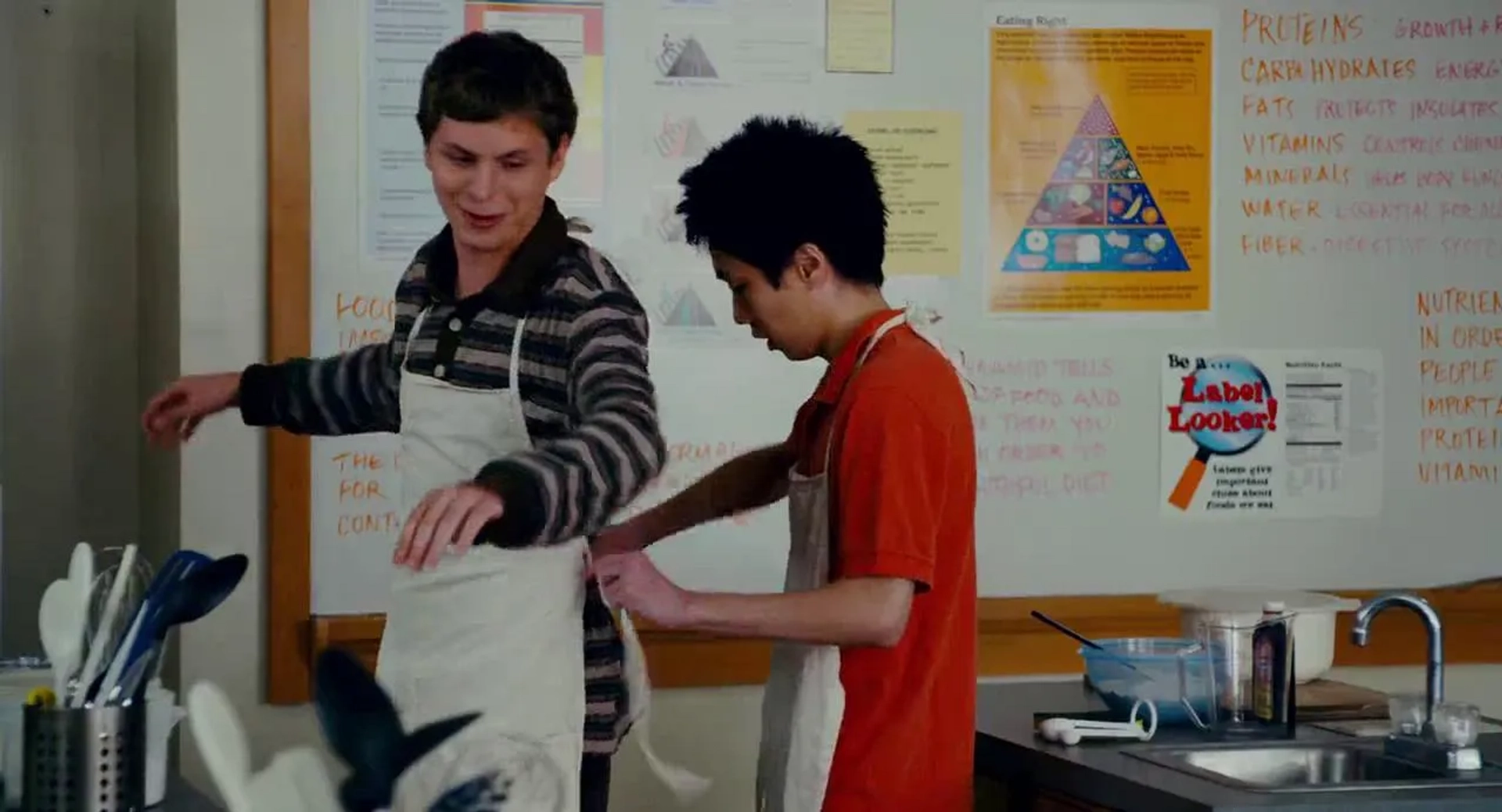 Michael Cera and Roger Iwami in Superbad (2007)