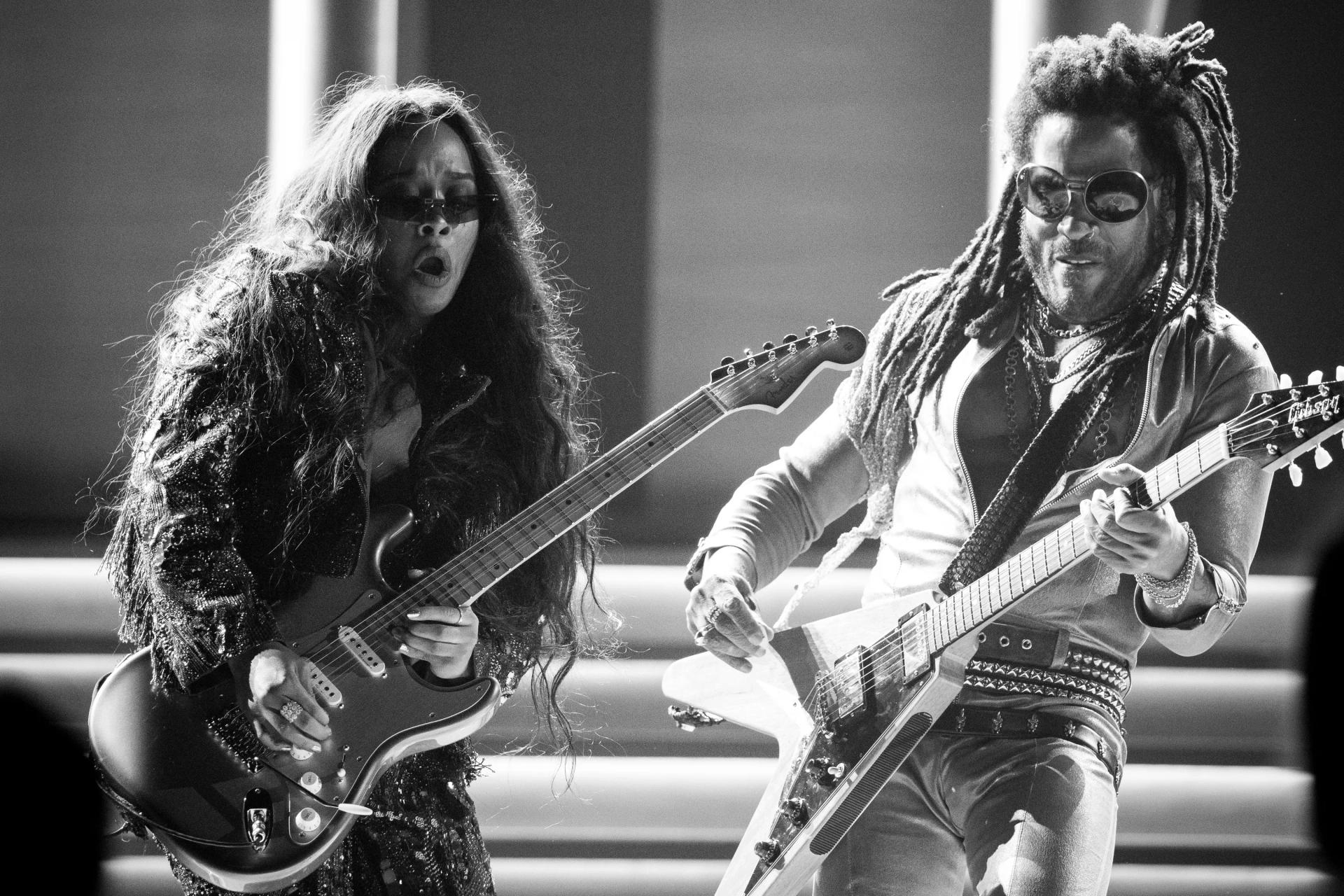 Lenny Kravitz and H.E.R. at an event for The 64th Annual Grammy Awards (2022)