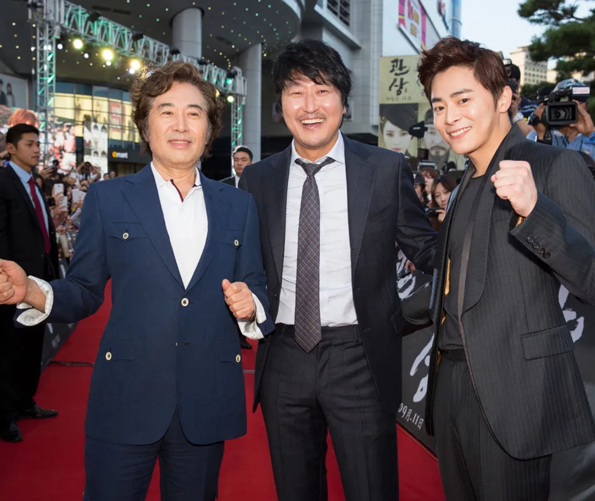 Song Kang-ho and Jo Jung-Suk at an event for The Face Reader (2013)