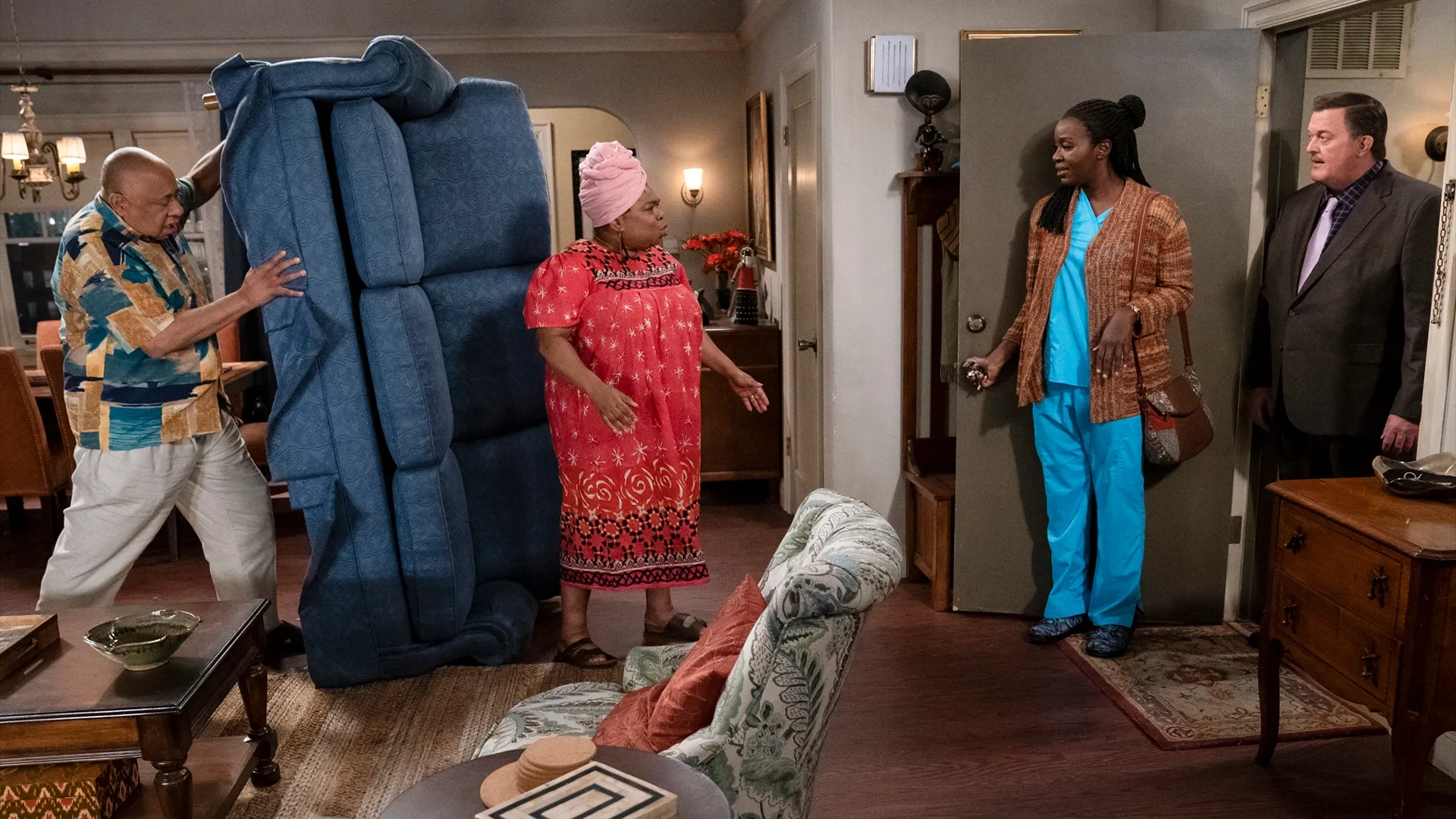 Barry Shabaka Henley, Billy Gardell, Shola Adewusi, and Folake Olowofoyeku in Bob Hearts Abishola (2019)