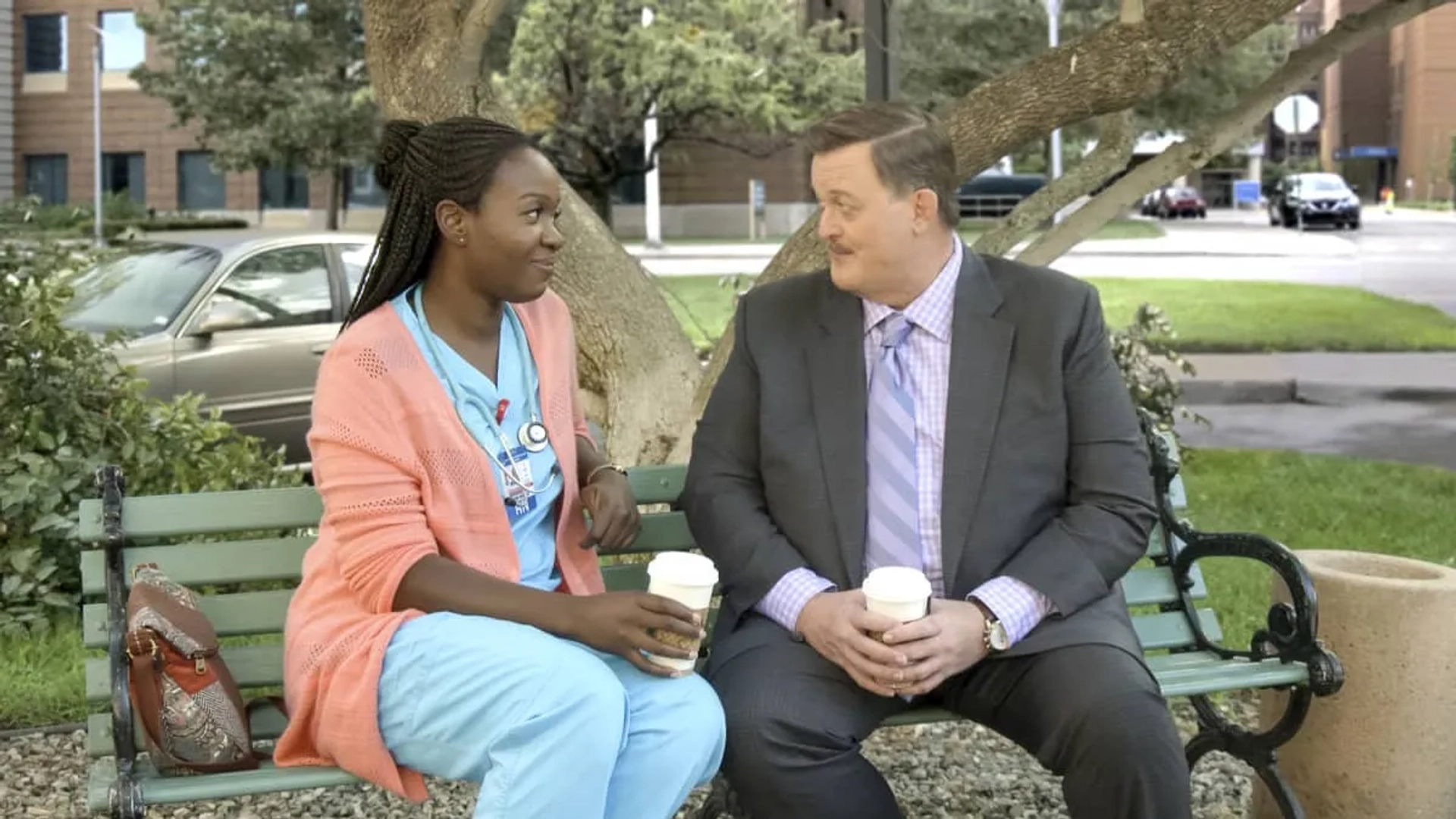 Billy Gardell and Folake Olowofoyeku in Bob Hearts Abishola (2019)