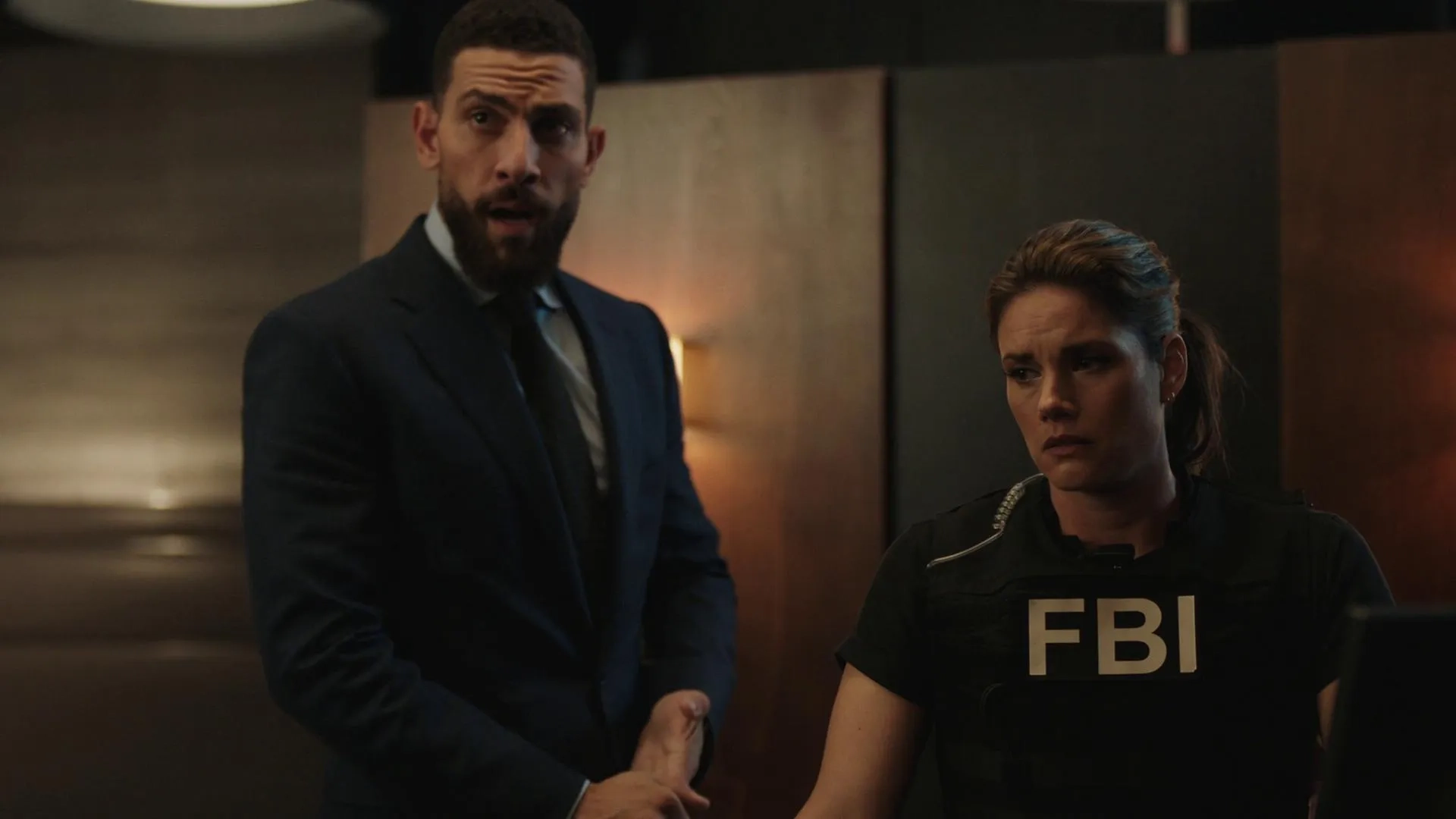 Missy Peregrym and Zeeko Zaki in FBI: Most Wanted: Exposed (2021)