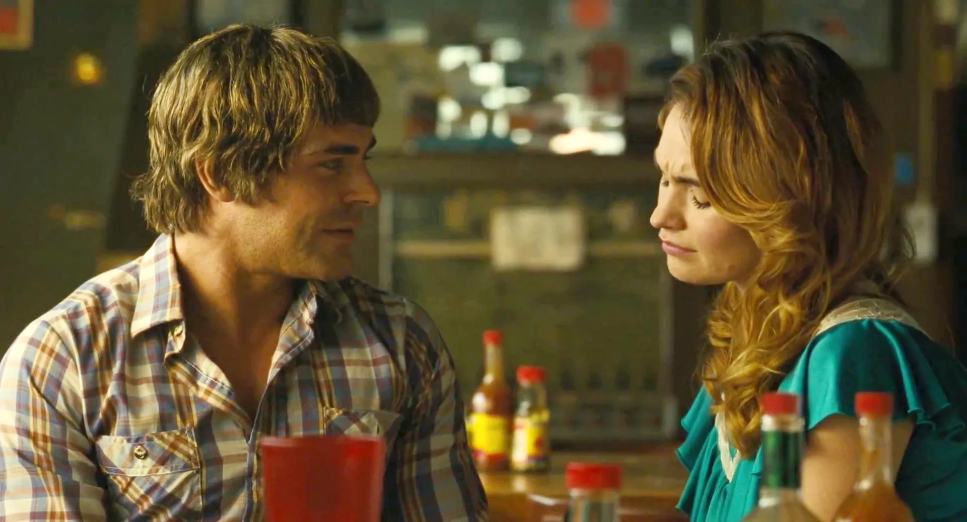 Zac Efron and Lily James in The Iron Claw (2023)