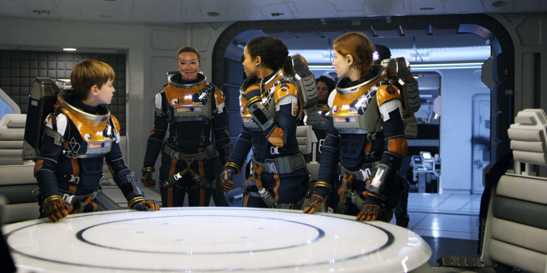 Parker Posey, Molly Parker, Maxwell Jenkins, Mina Sundwall, and Taylor Russell in Lost in Space (2018)