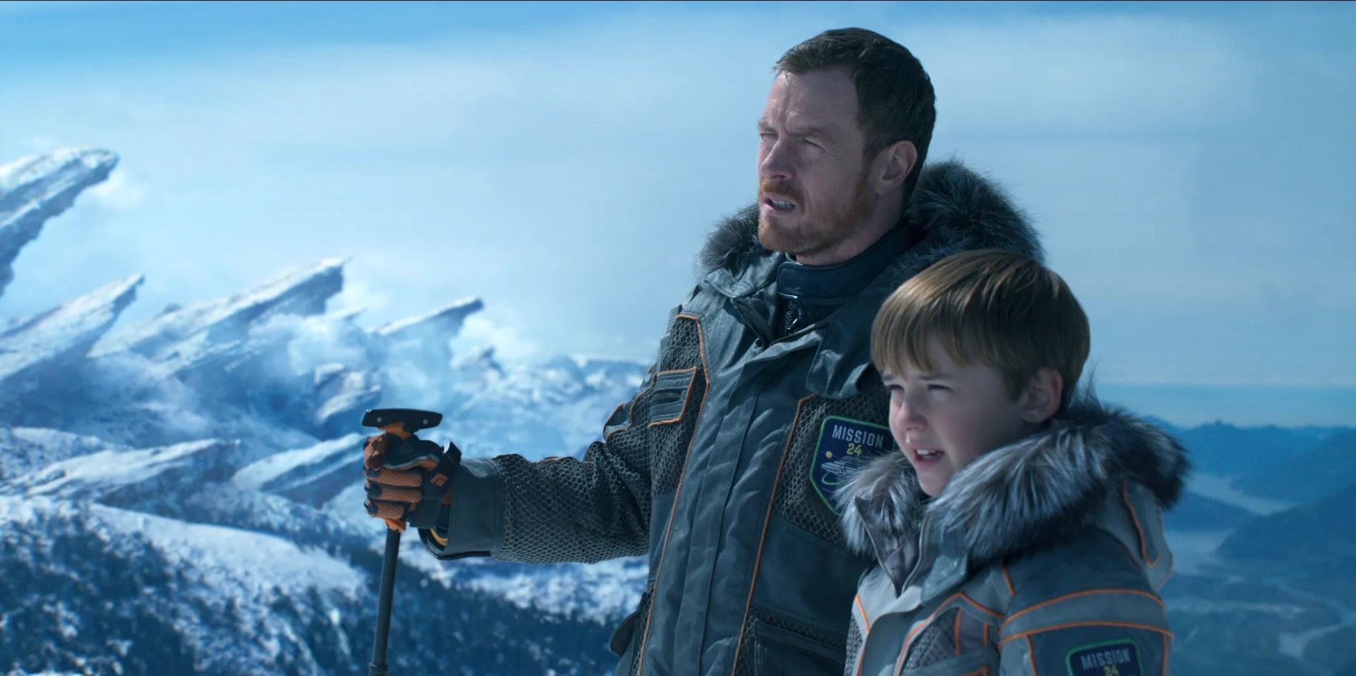 Toby Stephens and Maxwell Jenkins in Lost in Space (2018)