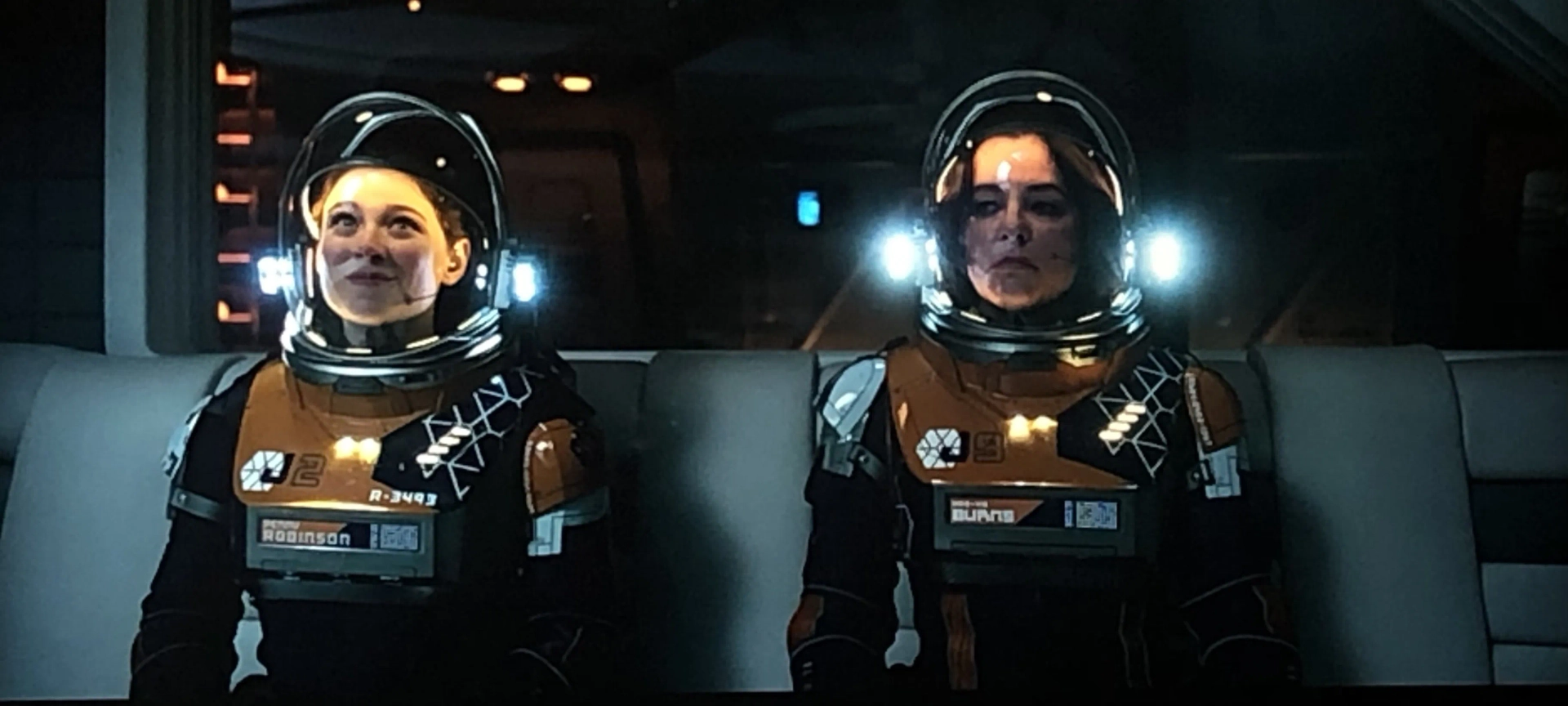 Parker Posey and Mina Sundwall in Lost in Space: Contingencies on Contingencies (2021)