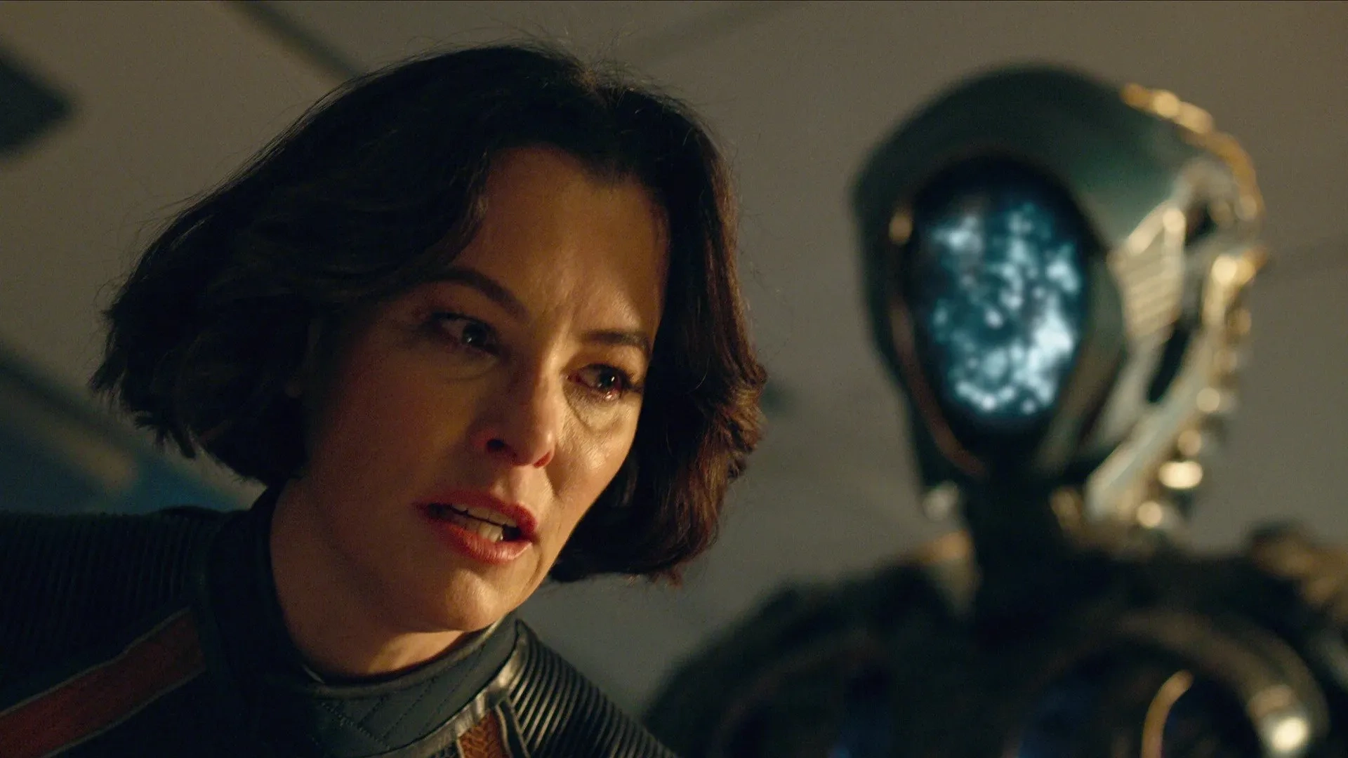 Parker Posey and Brian Steele in Lost in Space: Trust (2021)