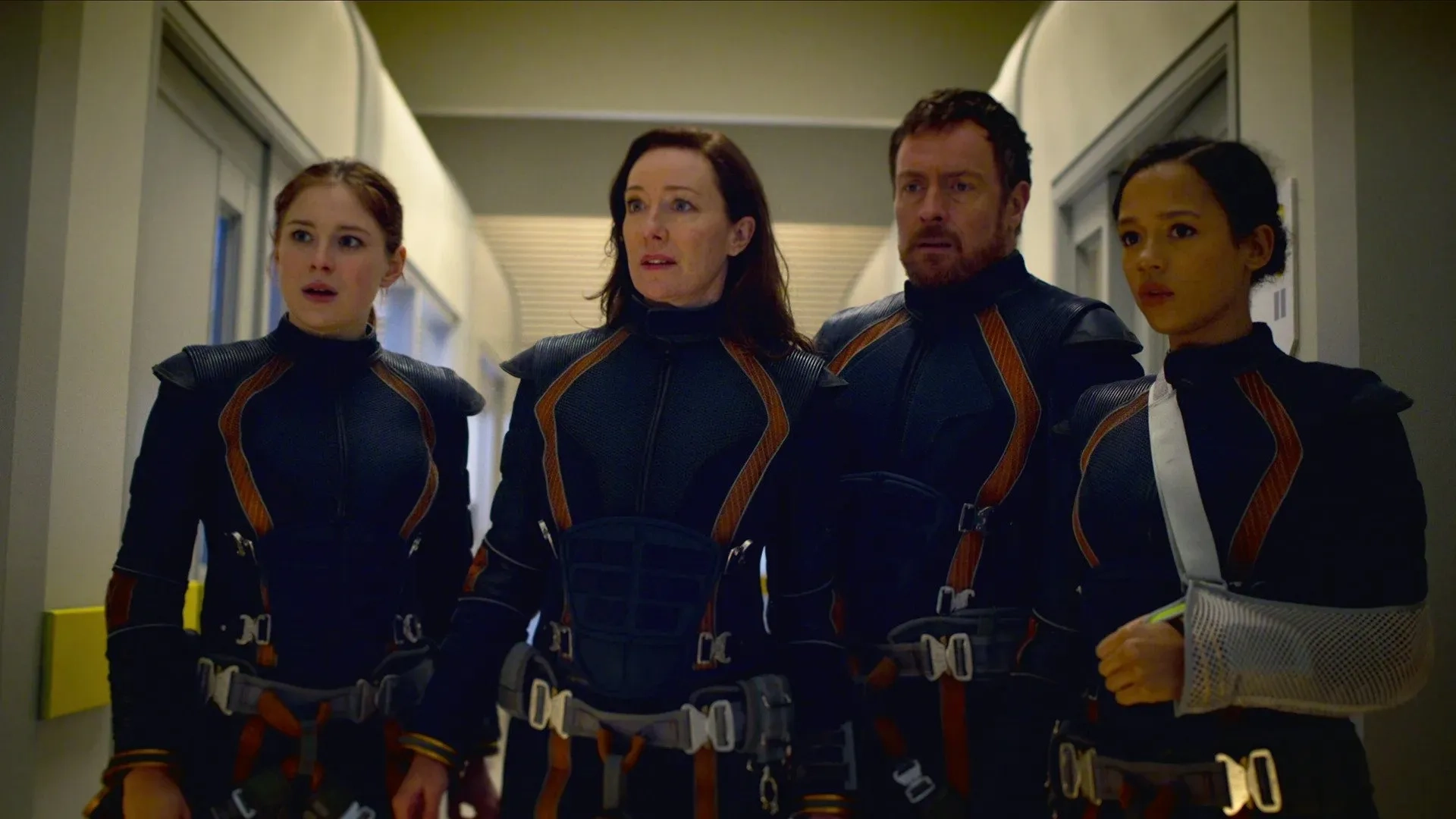 Molly Parker, Toby Stephens, Mina Sundwall, and Taylor Russell in Lost in Space: Contingencies on Contingencies (2021)