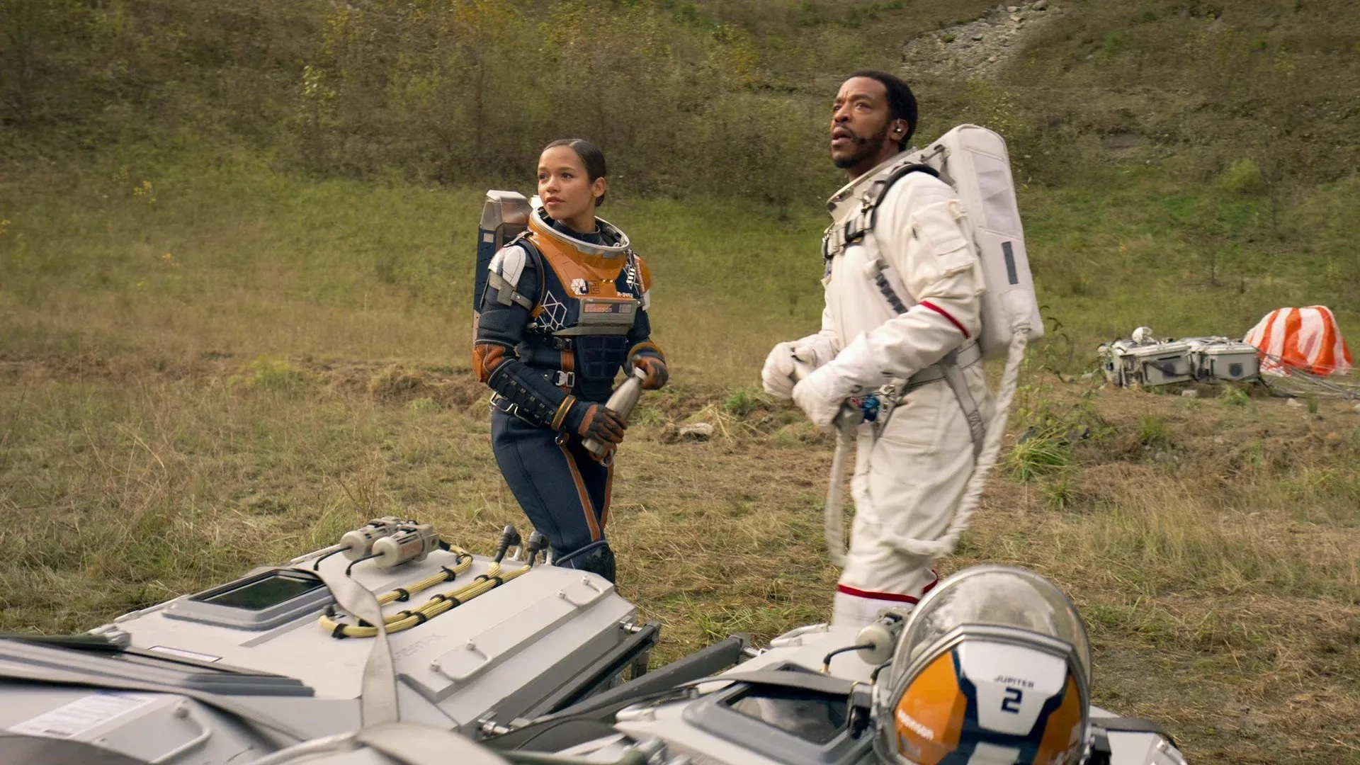 Russell Hornsby and Taylor Russell in Lost in Space: The New Guy (2021)