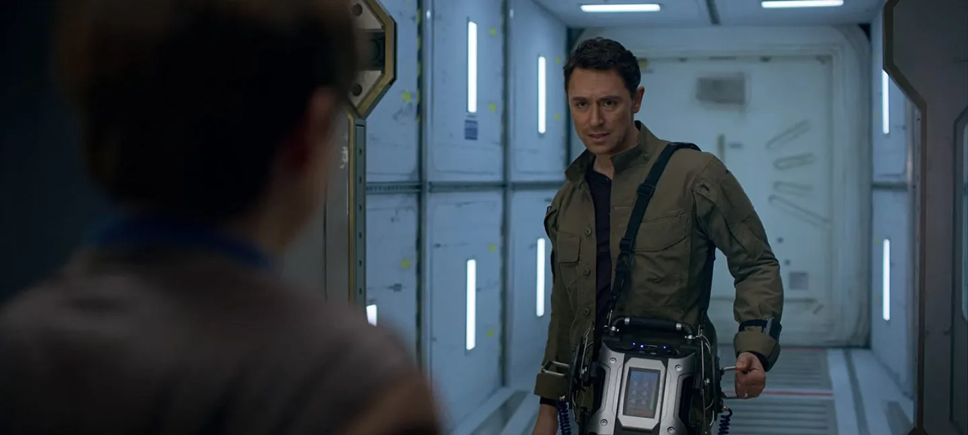 JJ Feild and Maxwell Jenkins in Lost in Space (2018)