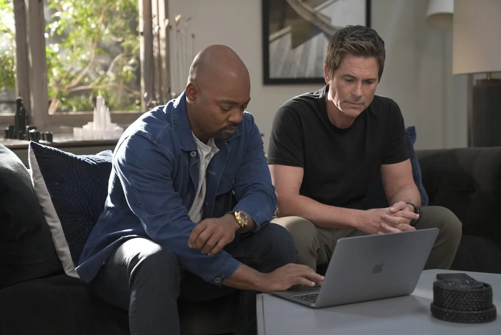 Rob Lowe and Brian Michael Smith in 9-1-1: Lone Star (2020)