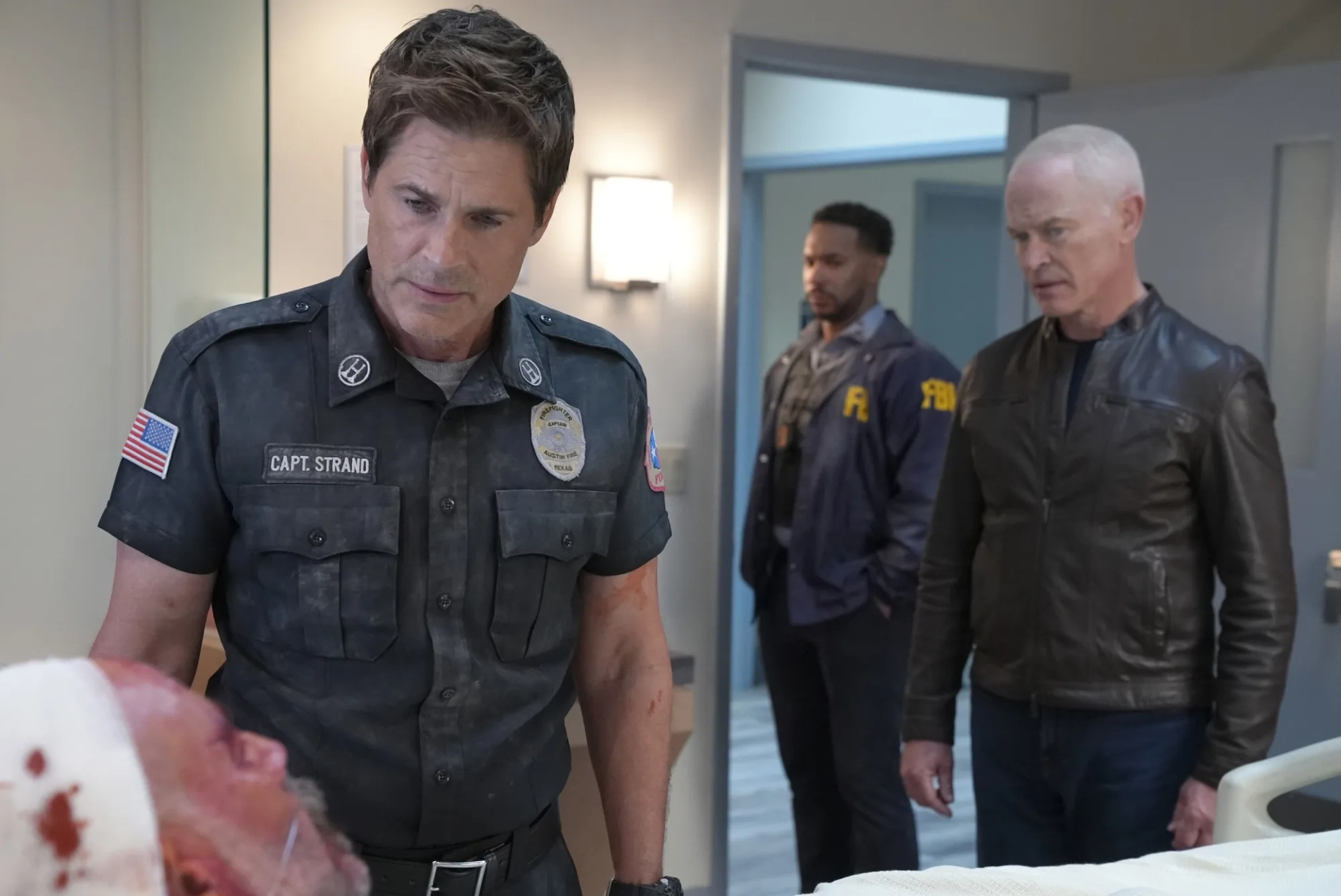 Rob Lowe, Neal McDonough, and Rob Parks in 9-1-1: Lone Star (2020)