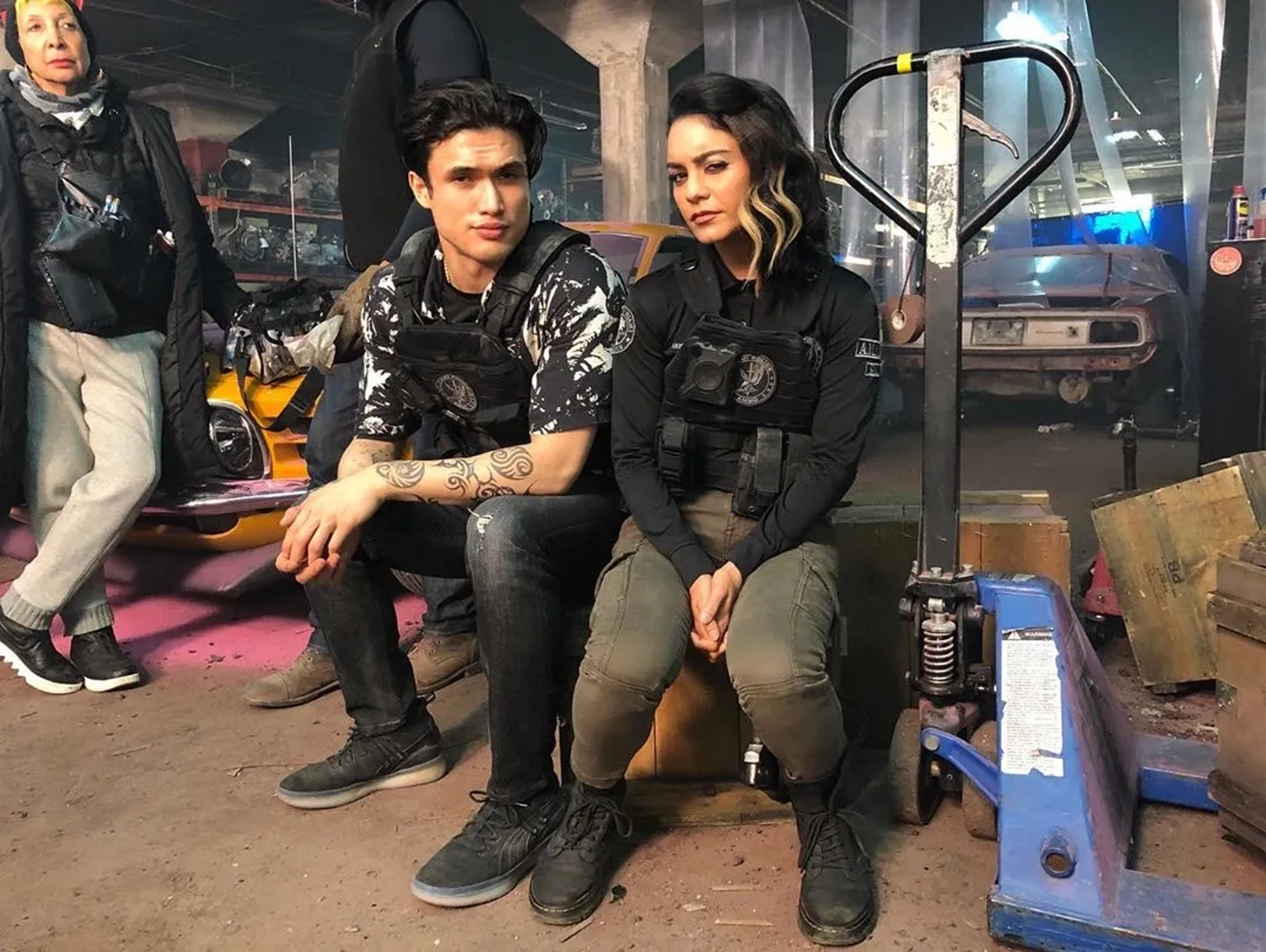 Vanessa Hudgens and Charles Melton in Bad Boys for Life (2020)