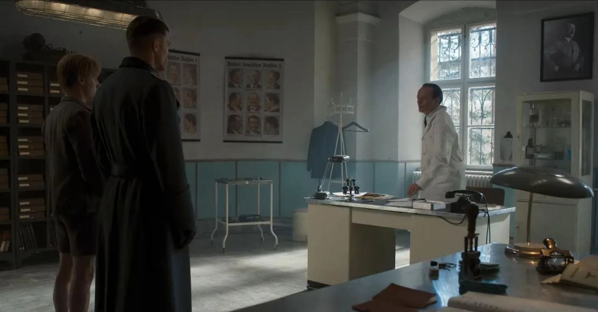 As Dr. Heinrich in ATLWCS (with Louis Hofmann & Ed Skrein)