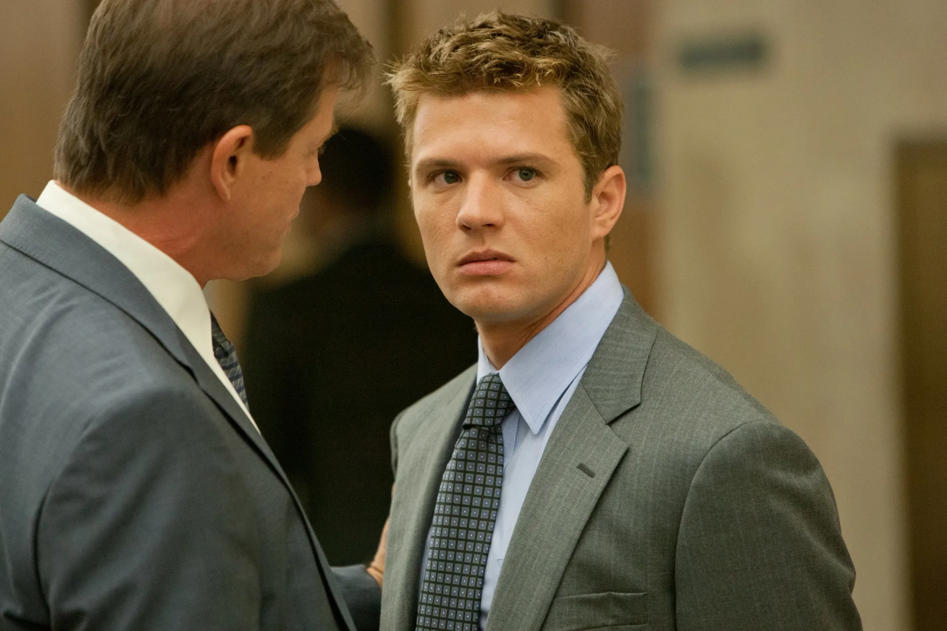 Ryan Phillippe and Michael Paré in The Lincoln Lawyer (2011)