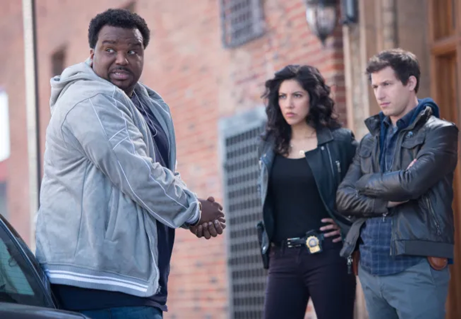 Craig Robinson, Andy Samberg, and Stephanie Beatriz in Brooklyn Nine-Nine (2013)