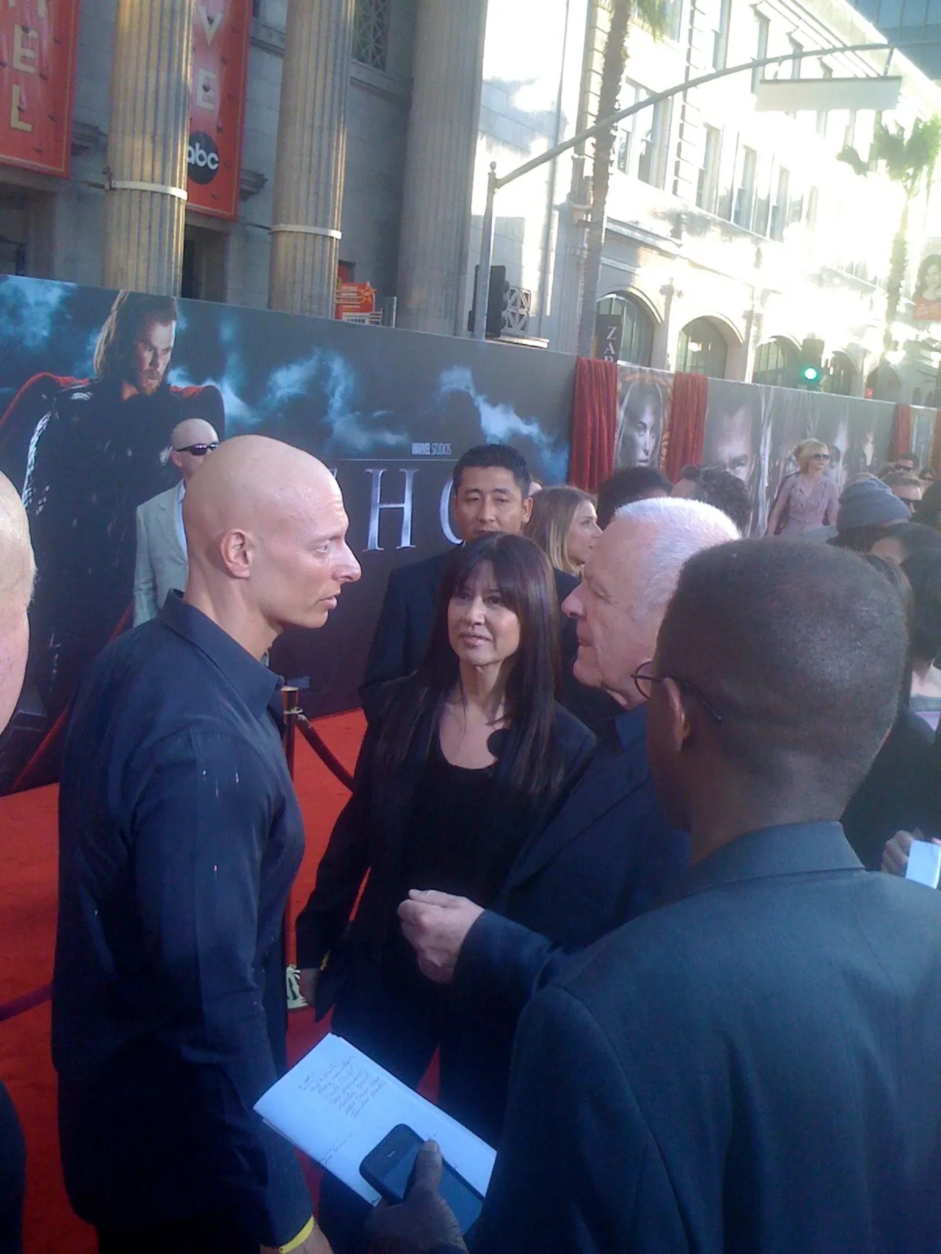 HOLLYWOOD, CA - MAY 2: Joseph Gatt, Stella Arroyave and Anthony Hopkins chat on the red carpet as they arrive for the Los Angeles Premiere of Marvel and Paramount Pictures' "Thor" held at the El Capitan Theater on May 2, 2011 in Hollywood, California.