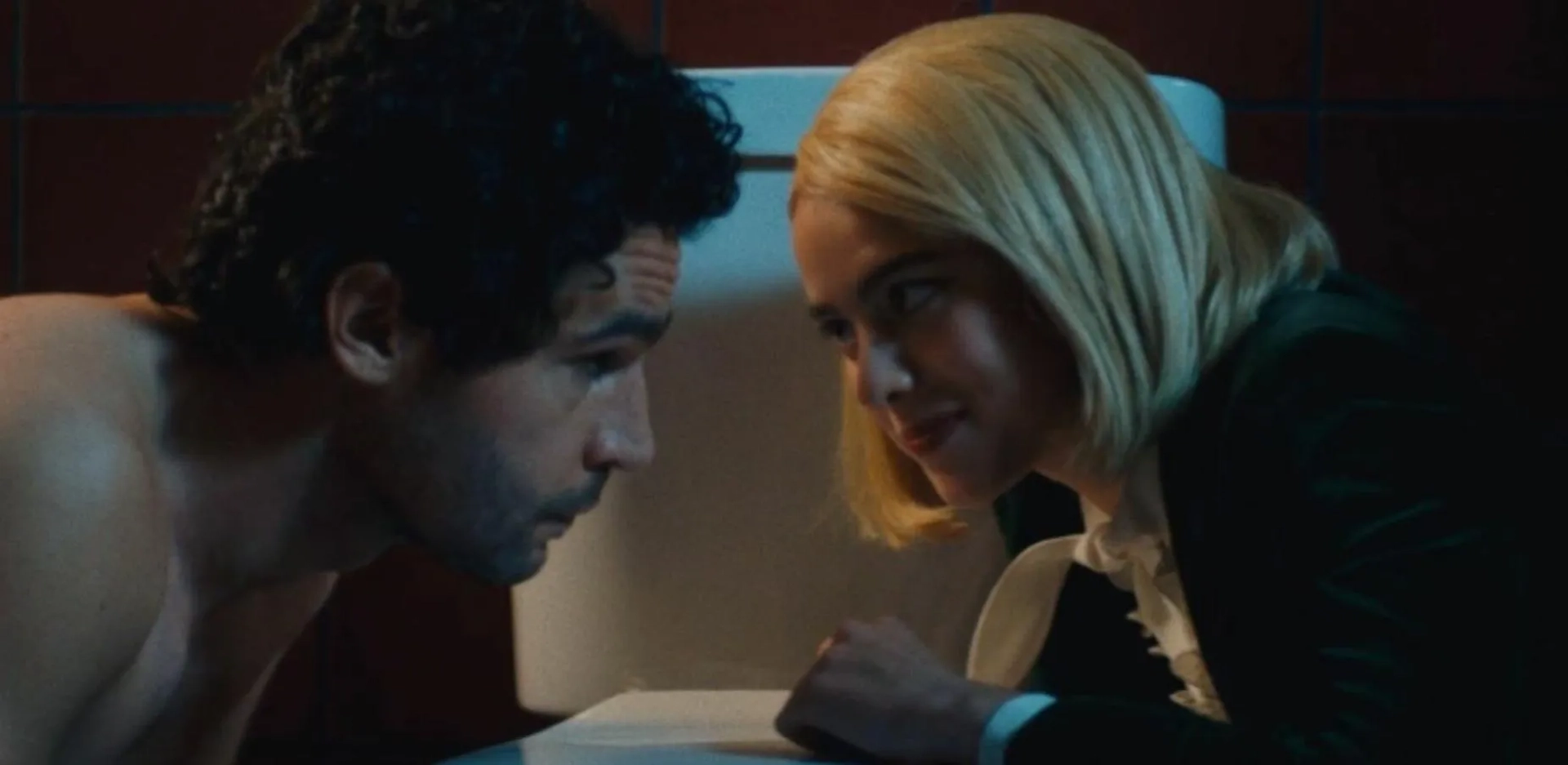 Christopher Abbott and Margaret Qualley in Sanctuary (2022)